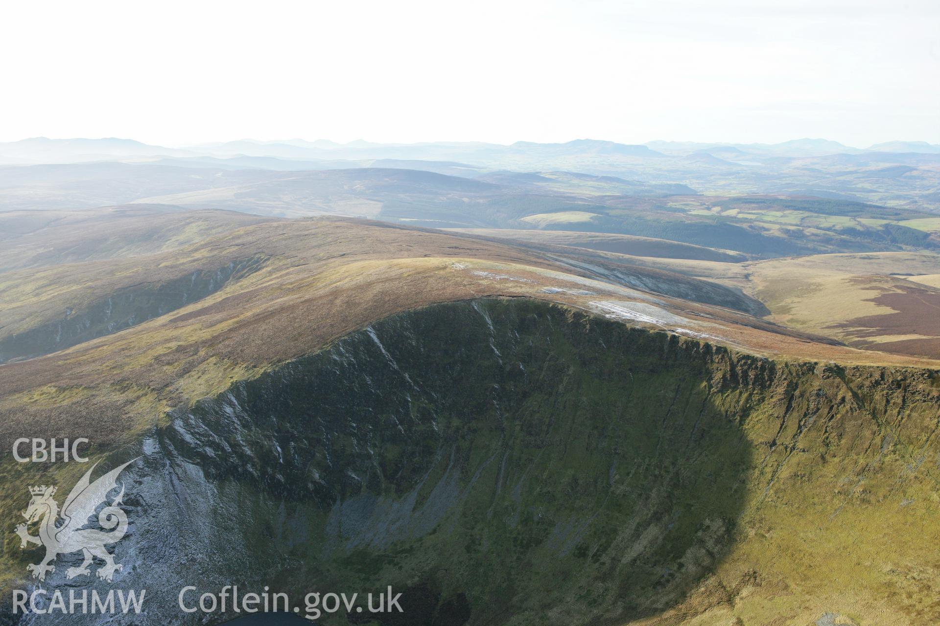 RCAHMW colour oblique photograph of Moel Sych summit and cairn. Taken by Toby Driver on 08/02/2011.