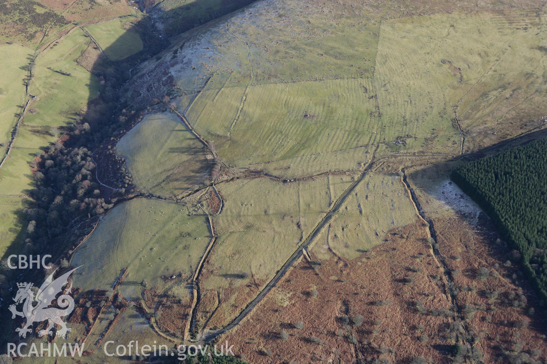 RCAHMW colour oblique photograph of Fridd yr Eglwys deserted rural settlement. Taken by Toby Driver on 08/02/2011.