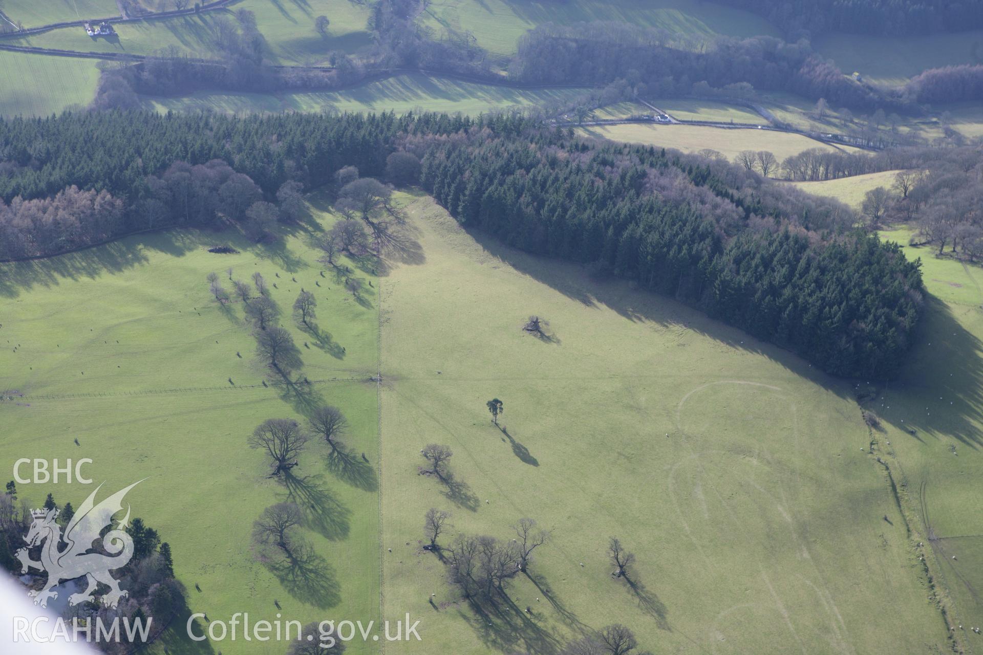 RCAHMW colour oblique photograph of earthworks to the east of Chirk Castle. Taken by Toby Driver on 08/02/2011.