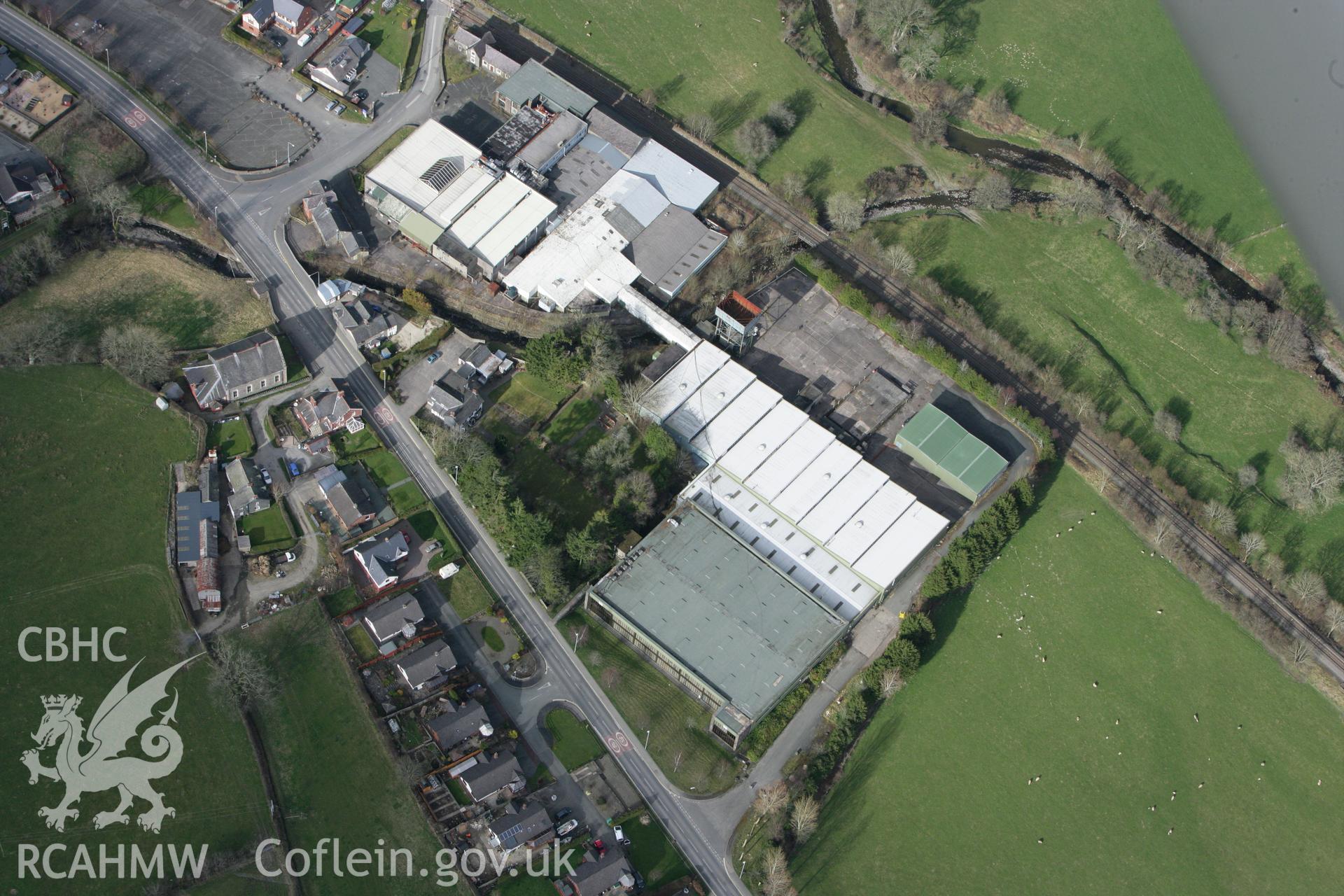 RCAHMW colour oblique photograph of Laura Ashley Factory, Carno. Taken by Toby Driver on 22/03/2011.