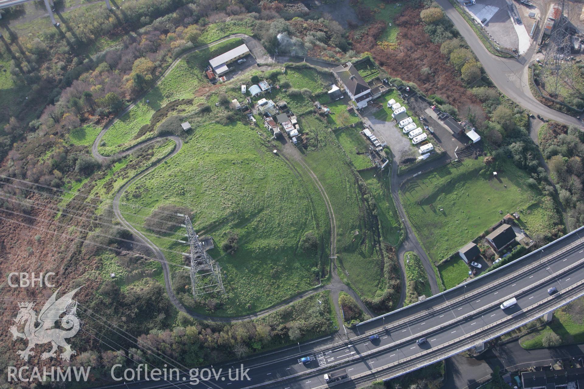 RCAHMW colour oblique photograph of Warren Hill enclosure. Taken by Toby Driver on 17/11/2011.