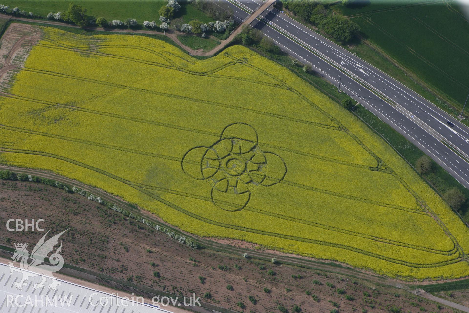 RCAHMW colour oblique photograph of Innage, Chepstow, modern crop circle. Taken by Toby Driver on 26/04/2011.