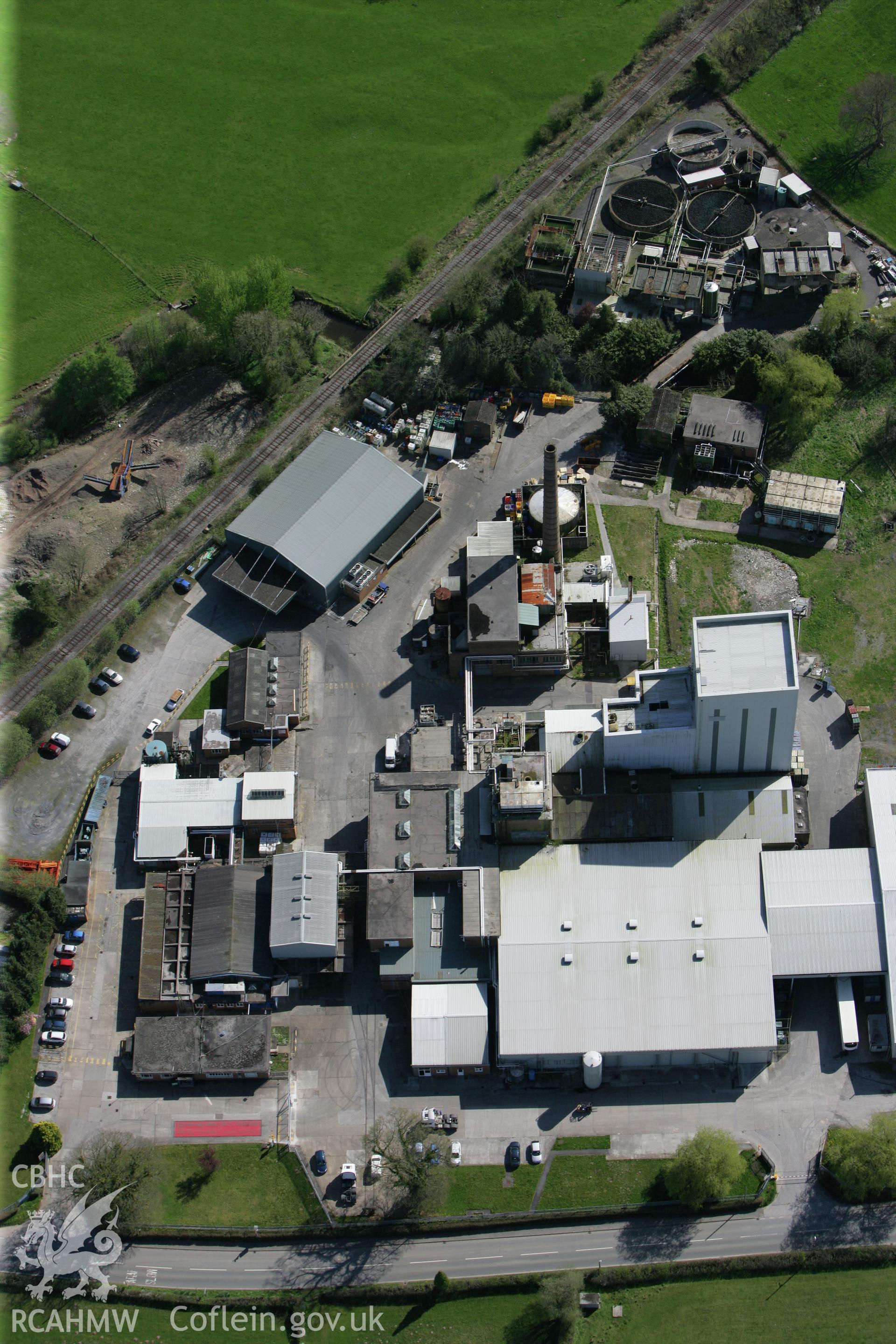 RCAHMW colour oblique photograph of Cws Creamery, Llangadog. Taken by Toby Driver on 08/04/2011.