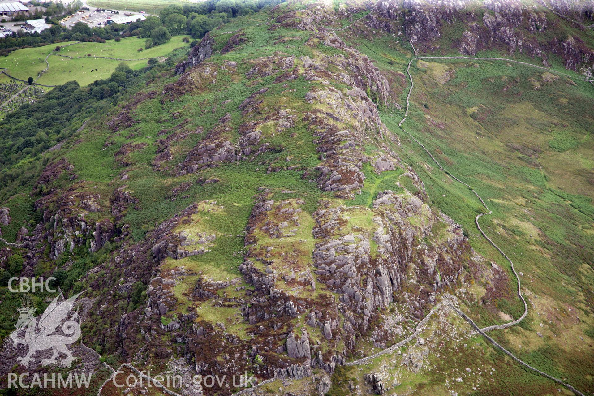 RCAHMW colour oblique photograph of Moel-y-Gest Hillfort, west of Porthmadog. Taken by Toby Driver on 17/08/2011.