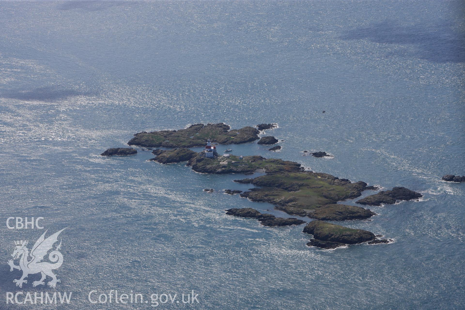 RCAHMW colour oblique photograph of Skerries Lighthouse, The Skerries, landscape from east. Taken by Toby Driver on 20/07/2011.