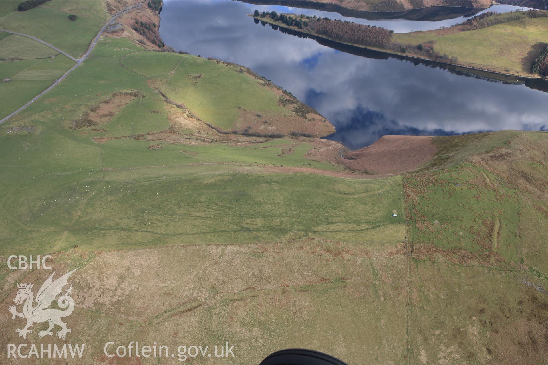 RCAHMW colour oblique photograph of Dinas Camp, Trefeglwys. Taken by Toby Driver on 22/03/2011.