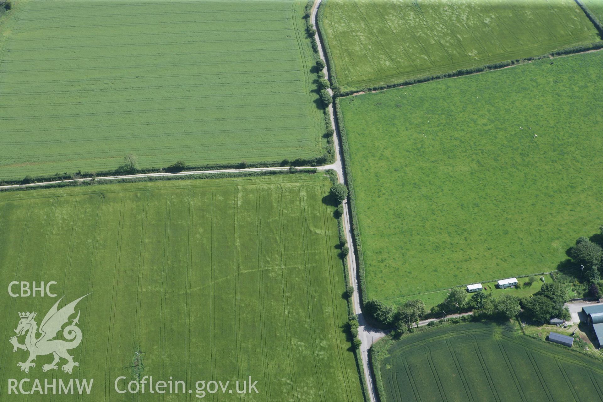 RCAHMW colour oblique photograph of Ffynnon enclosure. Taken by Toby Driver and Oliver Davies on 28/06/2011.