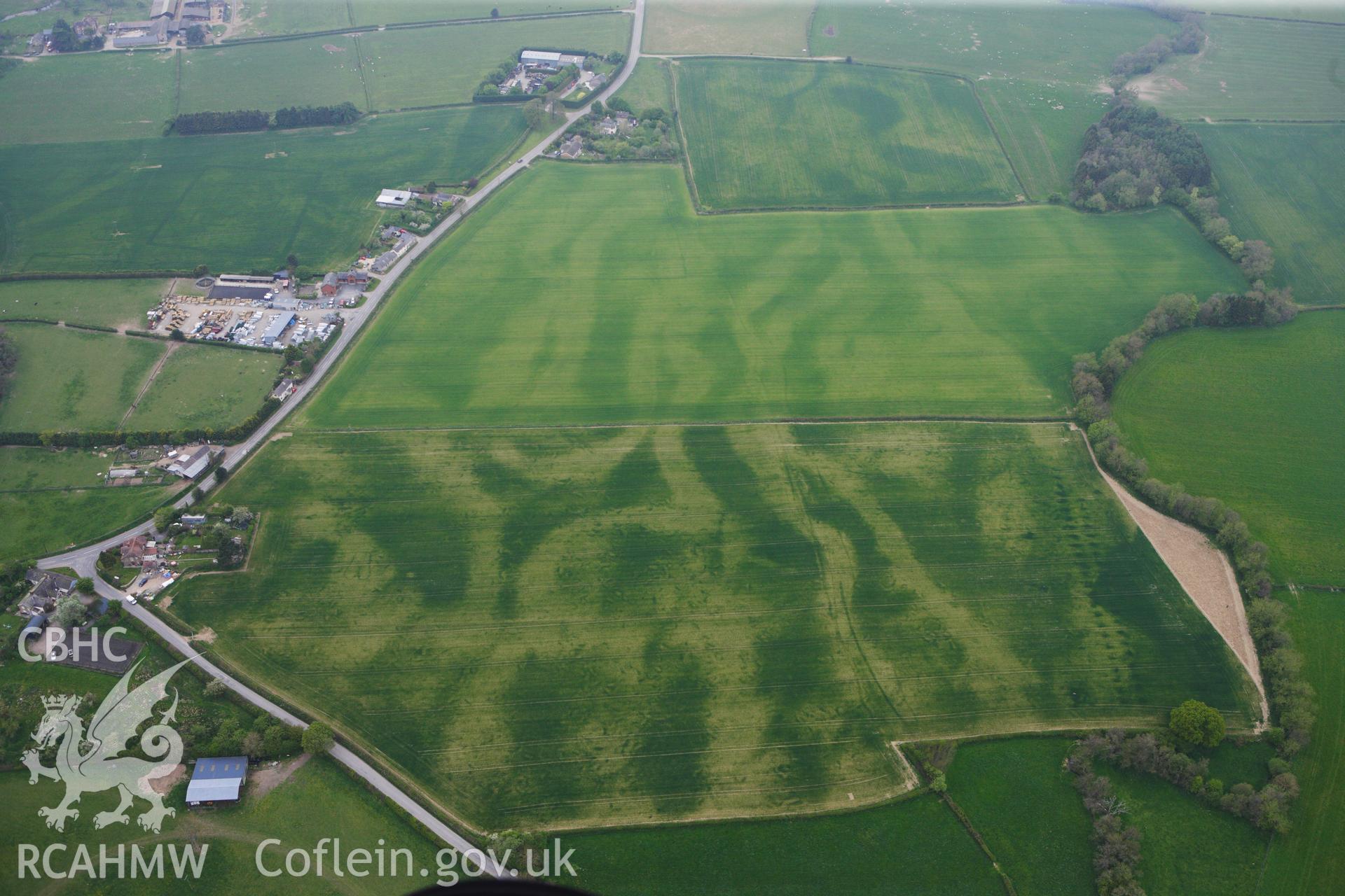 RCAHMW colour oblique photograph of Rossers Bridge, parallel pit alignment. Taken by Toby Driver on 26/04/2011.