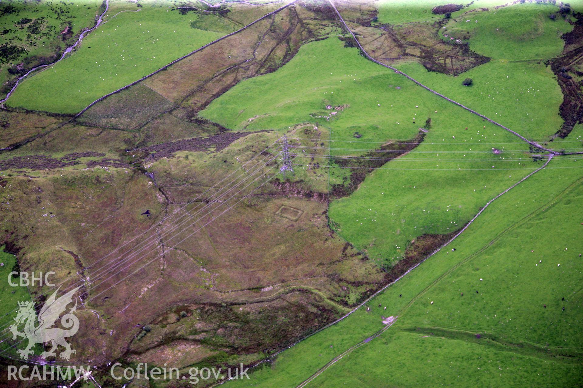 RCAHMW colour oblique photograph of a building to the east of Dolbelydr (suggested Roman Camp). Taken by Toby Driver on 17/08/2011.