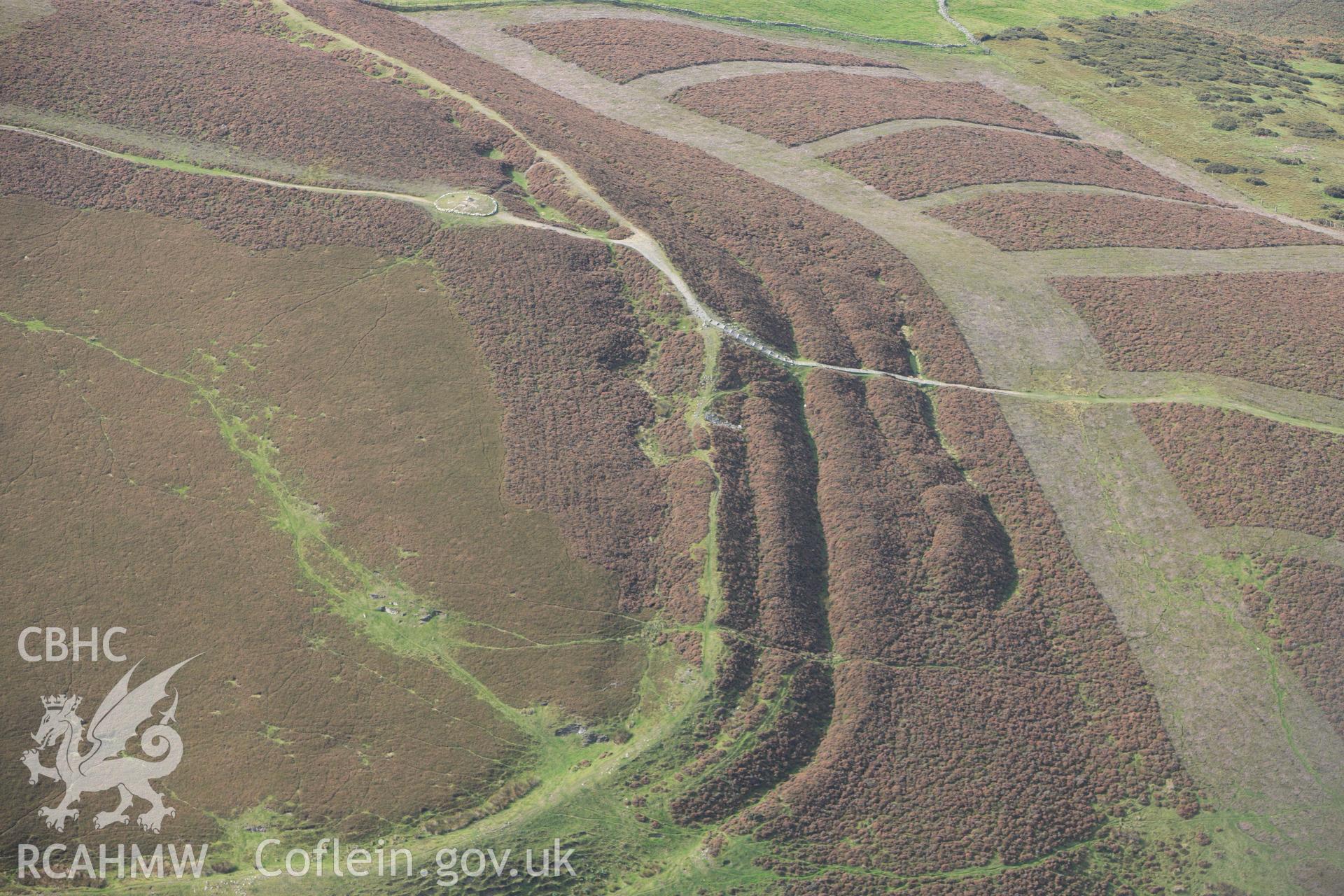RCAHMW colour oblique photograph of Penycloddiau Cairn. Taken by Toby Driver on 04/10/2011.