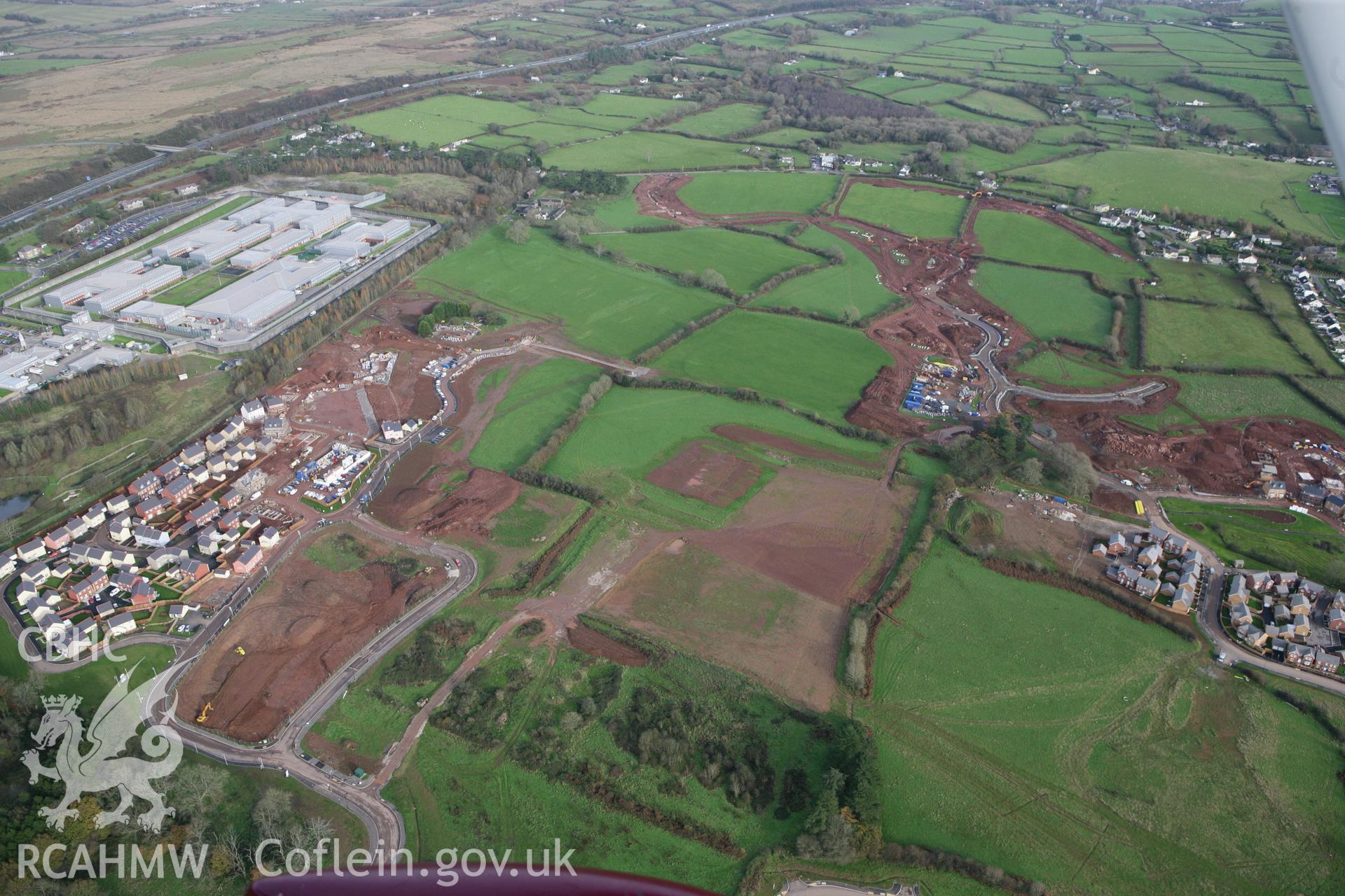 RCAHMW colour oblique photograph of Parc Derwen, new village under construction. Taken by Toby Driver on 17/11/2011.