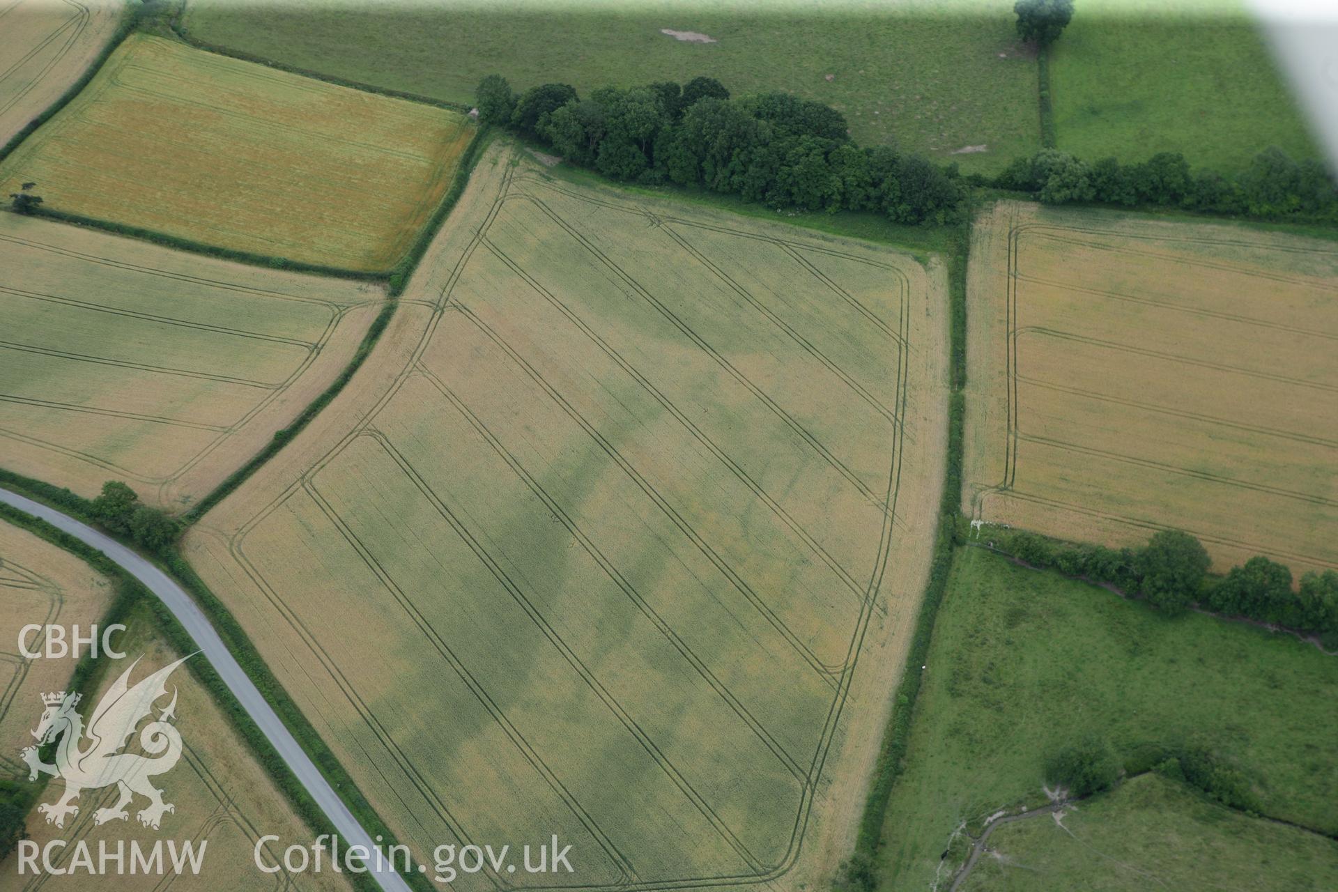RCAHMW colour oblique photograph of Penthryn Fechan cropmarks. Taken by Toby Driver on 20/07/2011.