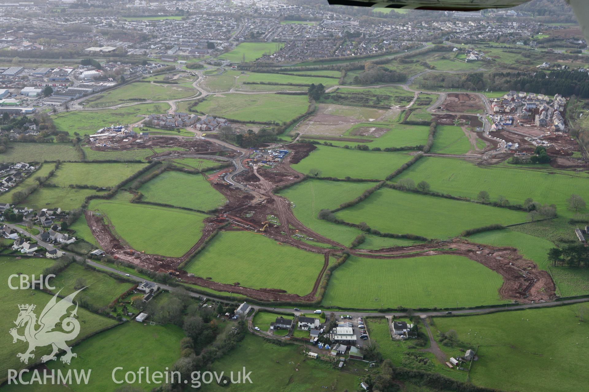 RCAHMW colour oblique photograph of Parc Derwen, new village under construction. Taken by Toby Driver on 17/11/2011.