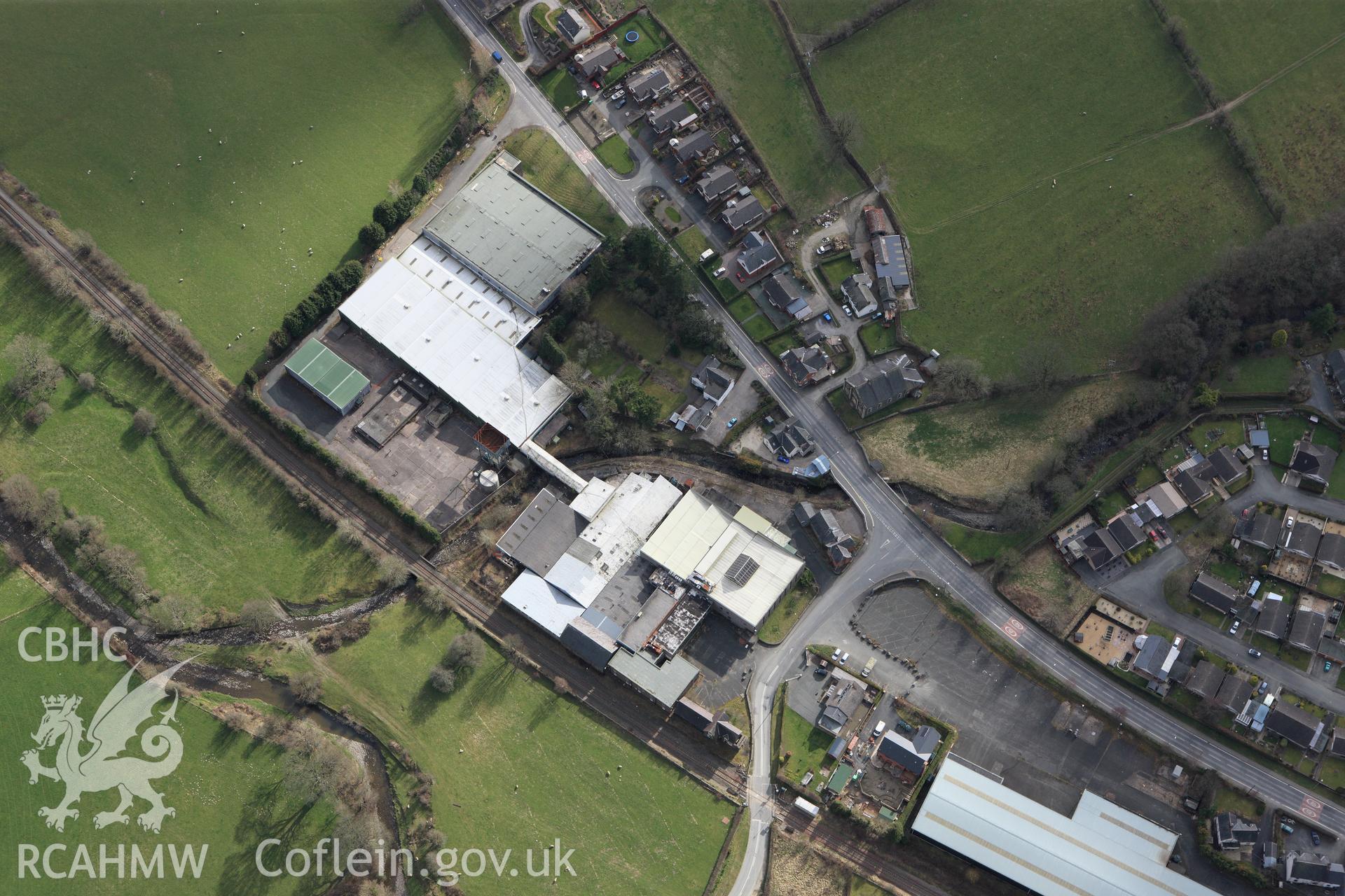 RCAHMW colour oblique photograph of Laura Ashley Factory, Carno. Taken by Toby Driver on 22/03/2011.