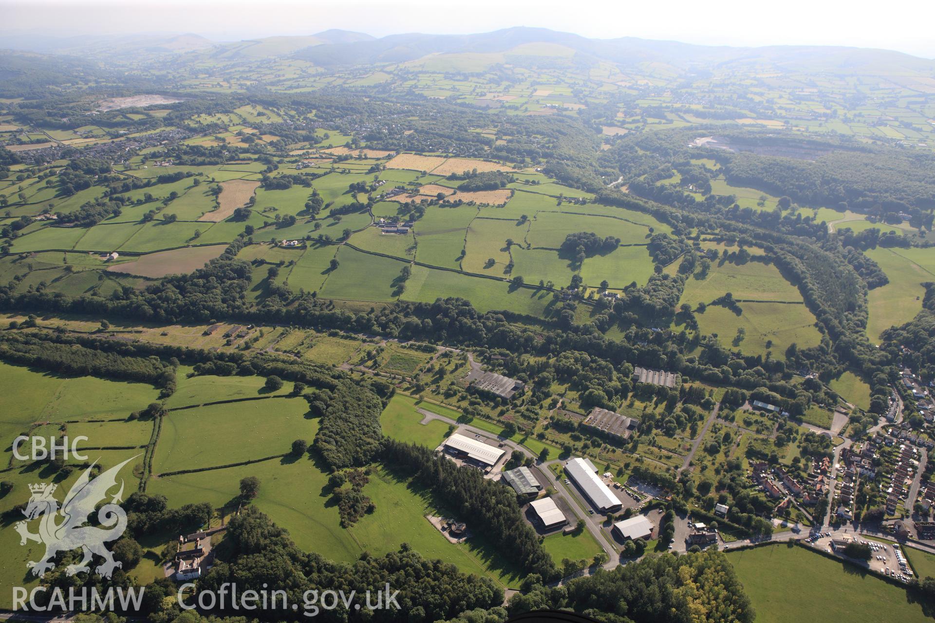 RCAHMW colour oblique photograph of Munitions factory valley works, Rhydymwyn. Taken by Toby Driver and Oliver Davies on 27/07/2011.