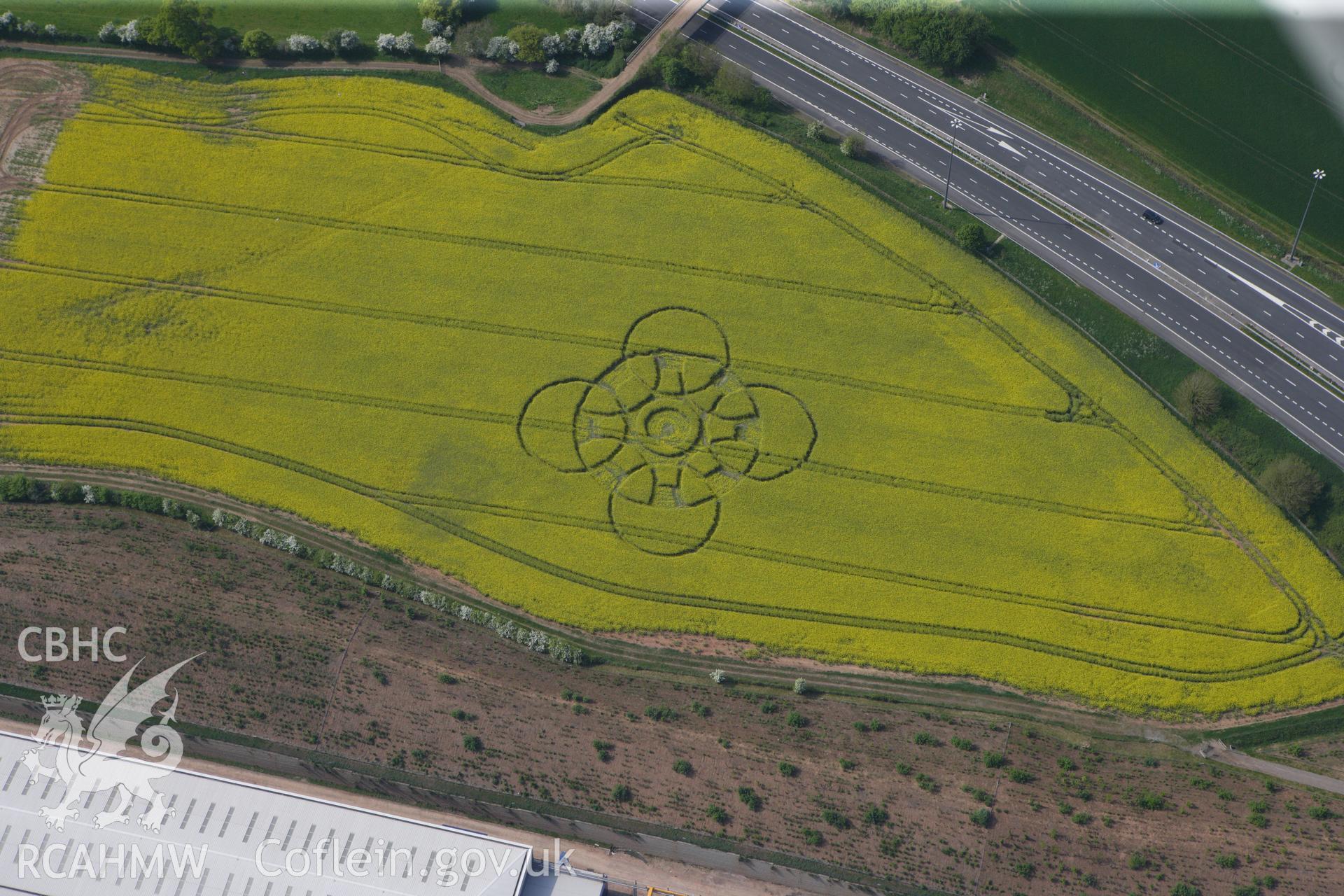 RCAHMW colour oblique photograph of Innage, Chepstow, modern crop circle. Taken by Toby Driver on 26/04/2011.