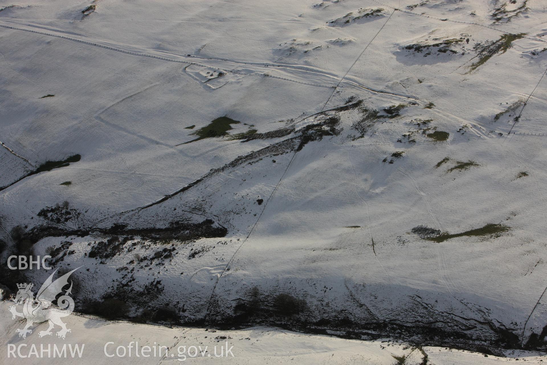 RCAHMW colour oblique photograph of Cefn Goleu enclosure 1, view looking south. Taken by Toby Driver on 18/12/2011.