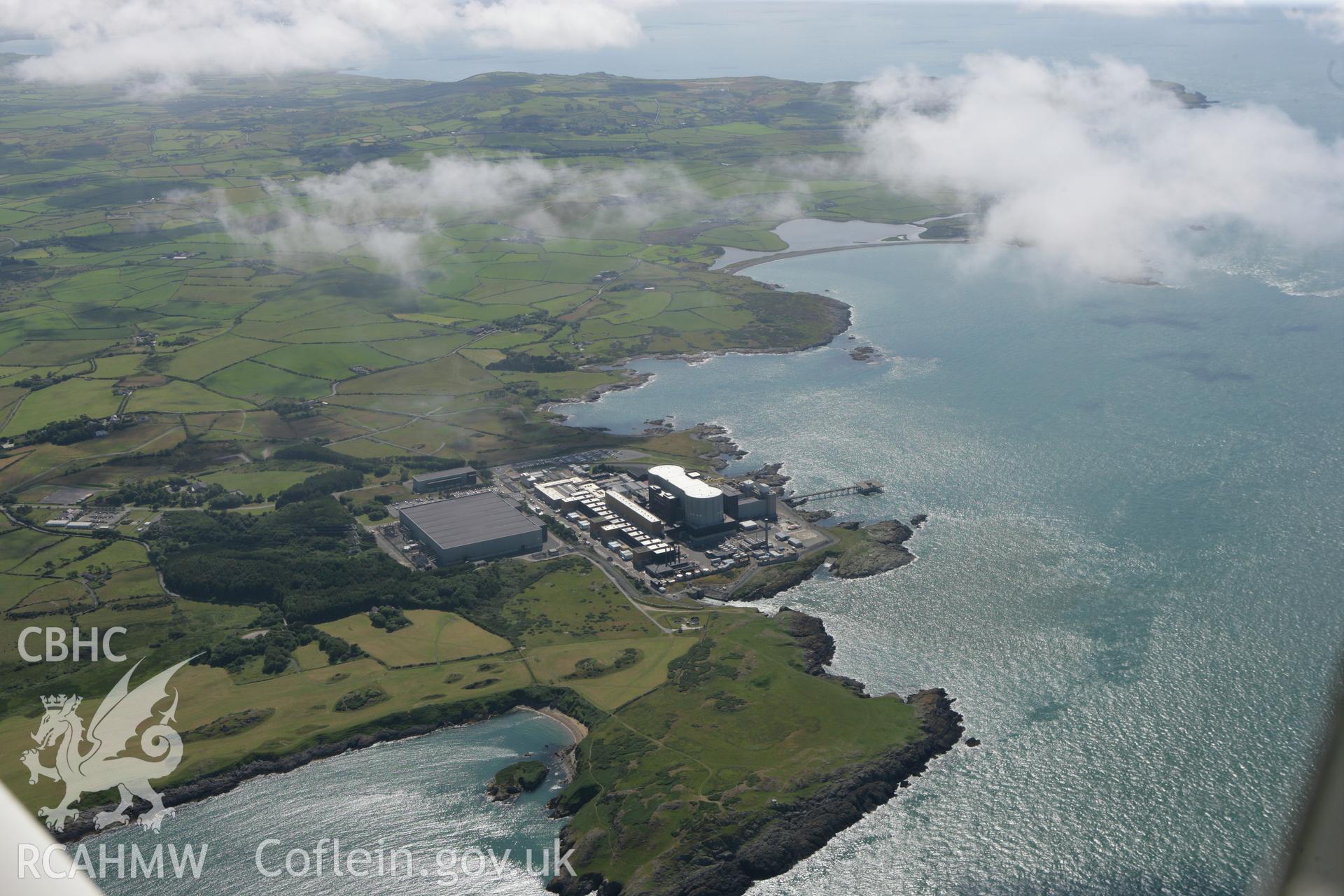RCAHMW colour oblique photograph of Wylfa Nuclear Power Station, high view. Taken by Toby Driver on 20/07/2011.