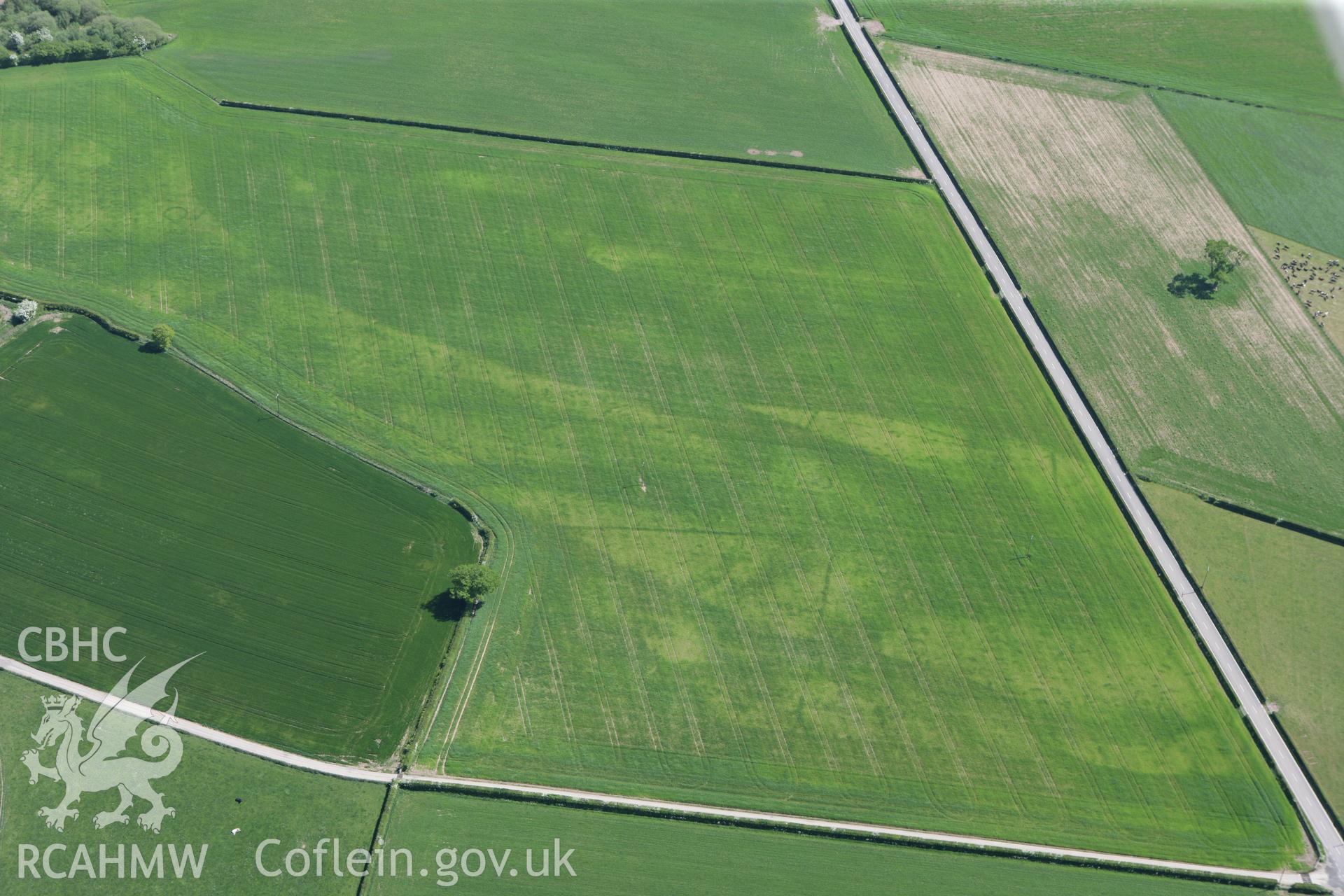 RCAHMW colour oblique photograph of Gerwyn-Fechan Round Barrow Cemetery. Taken by Toby Driver on 03/05/2011.