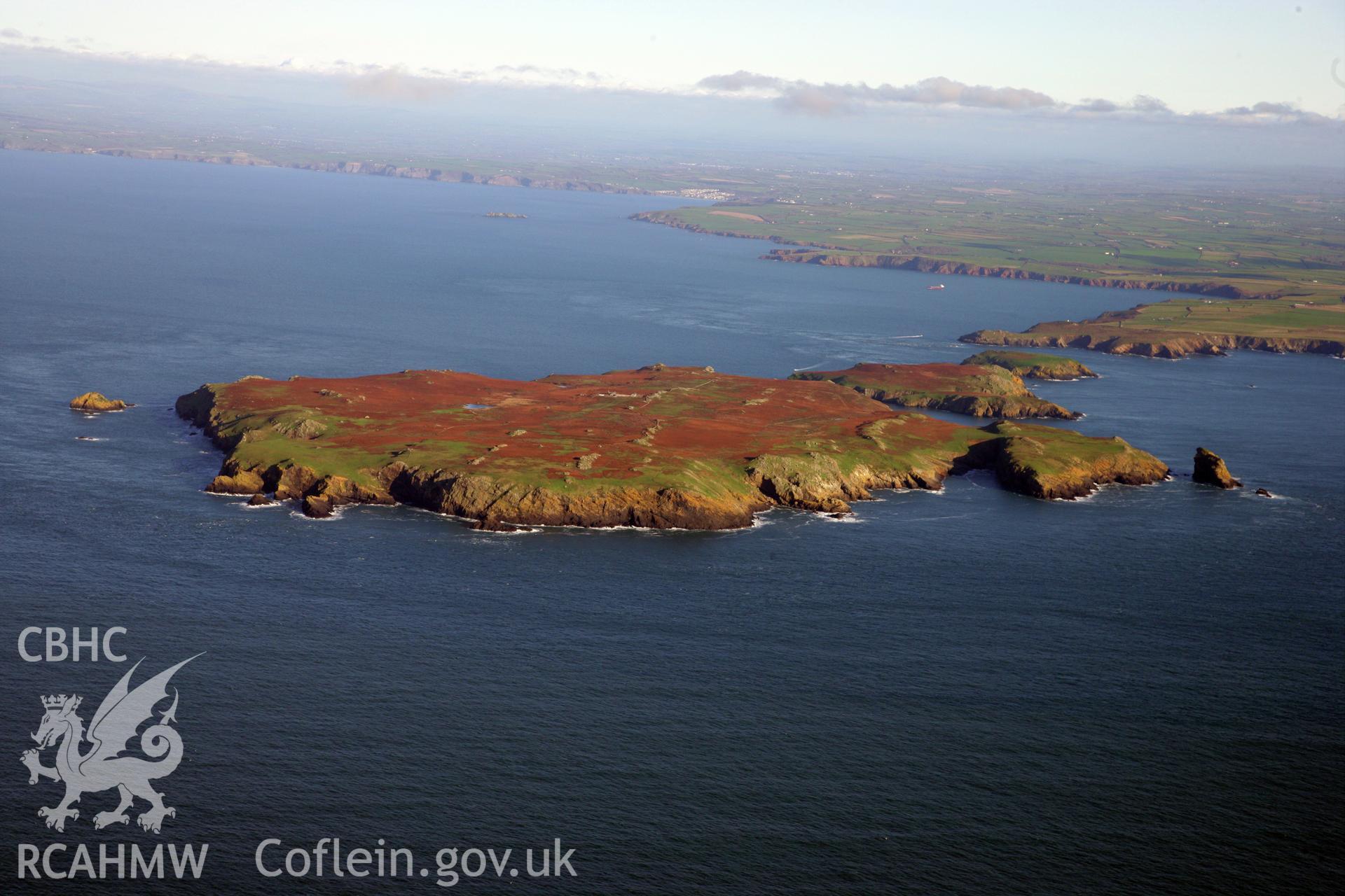 RCAHMW colour oblique photograph of Grassholm Island, viewed from the east. Taken by O. Davies & T. Driver on 22/11/2013.