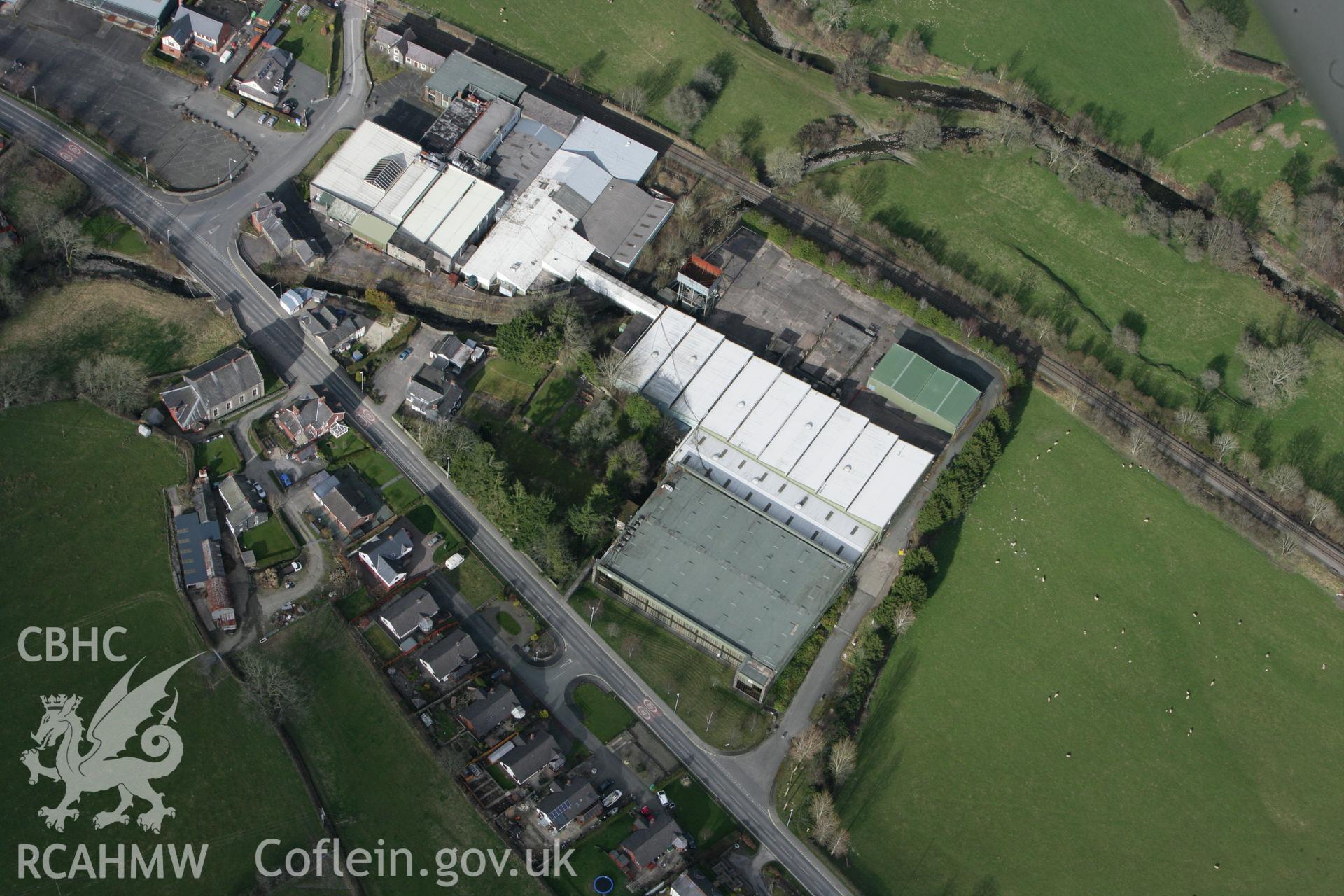 RCAHMW colour oblique photograph of Laura Ashley Factory, Carno. Taken by Toby Driver on 22/03/2011.