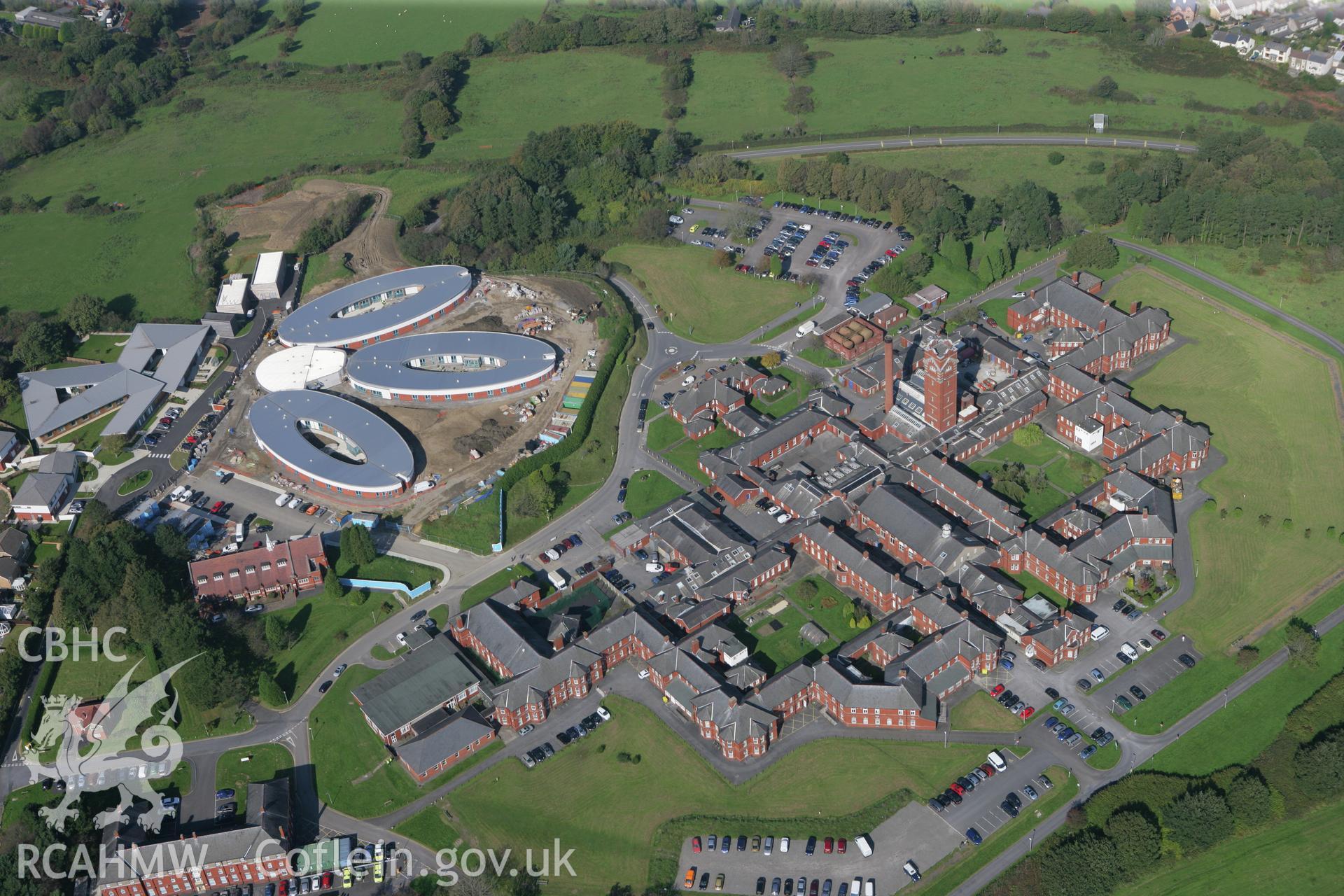 RCAHMW colour oblique photograph of Cefn Coed Hospital with new dementia unit, viewed from the south. Taken by Toby Driver and Oliver Davies on 28/09/2011.
