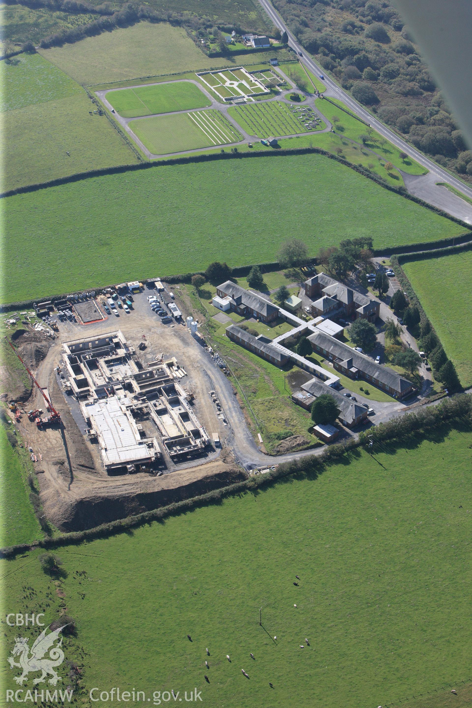 RCAHMW colour oblique photograph of Gwalia Mynydd Mawr, under construction, with Ysbyty Mynydd Mawr, Llannon. Taken by Toby Driver and Oliver Davies on 28/09/2011.