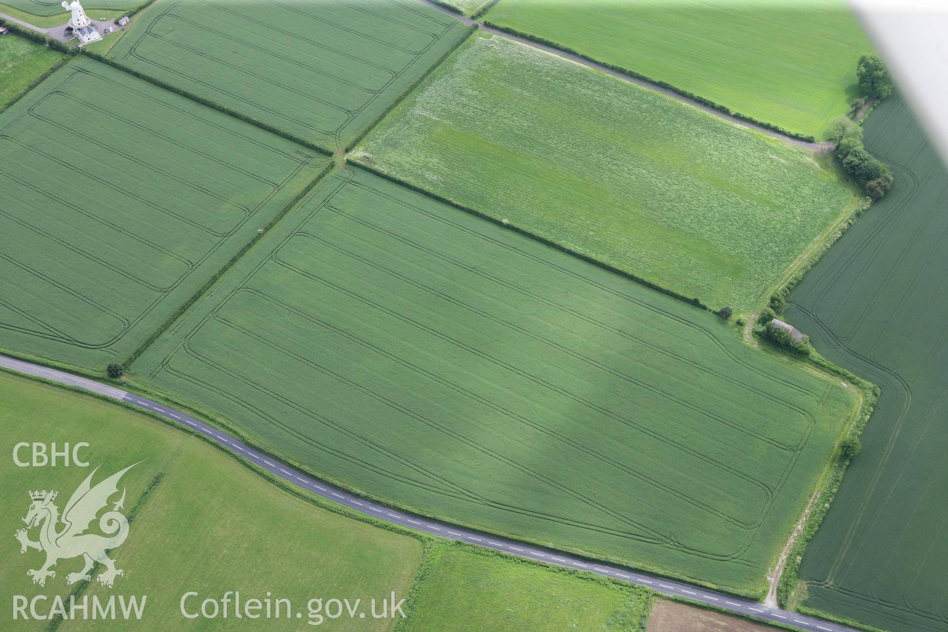 RCAHMW colour oblique photograph of Llancayo Farm barrow cemetery. Taken by Toby Driver on 13/06/2011.