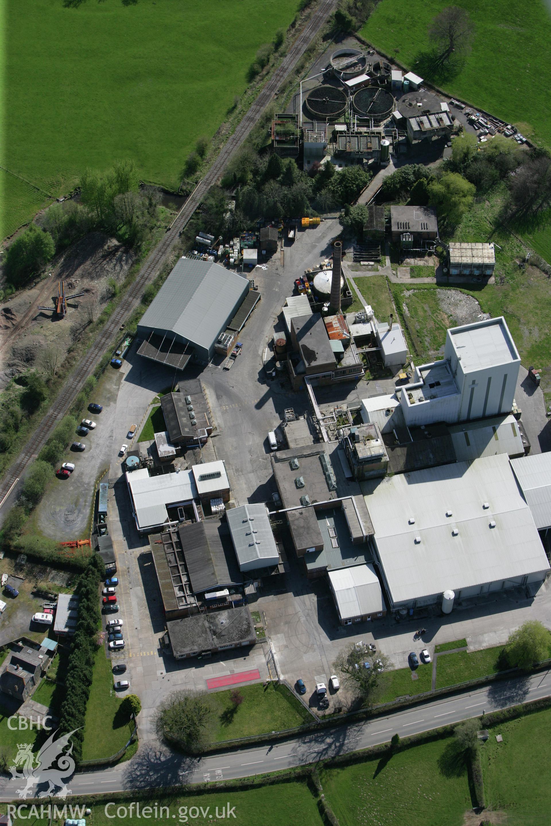 RCAHMW colour oblique photograph of Cws Creamery, Llangadog. Taken by Toby Driver on 08/04/2011.