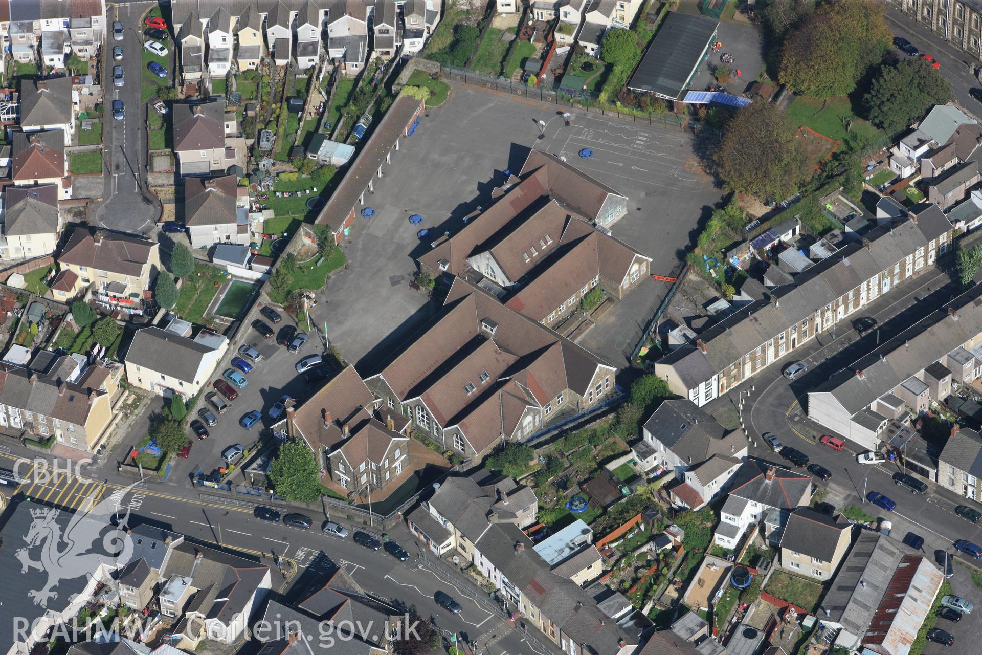 RCAHMW colour oblique photograph of Brynhyfryd Junior School with Siloh Chapel behind, from the south-west. Taken by Toby Driver and Oliver Davies on 28/09/2011.