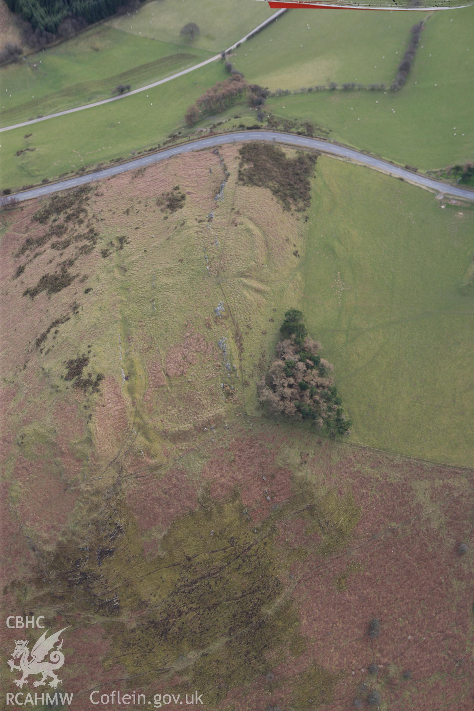 RCAHMW colour oblique photograph of Pen-y-Clun Hillfort. Taken by Toby Driver on 22/03/2011.