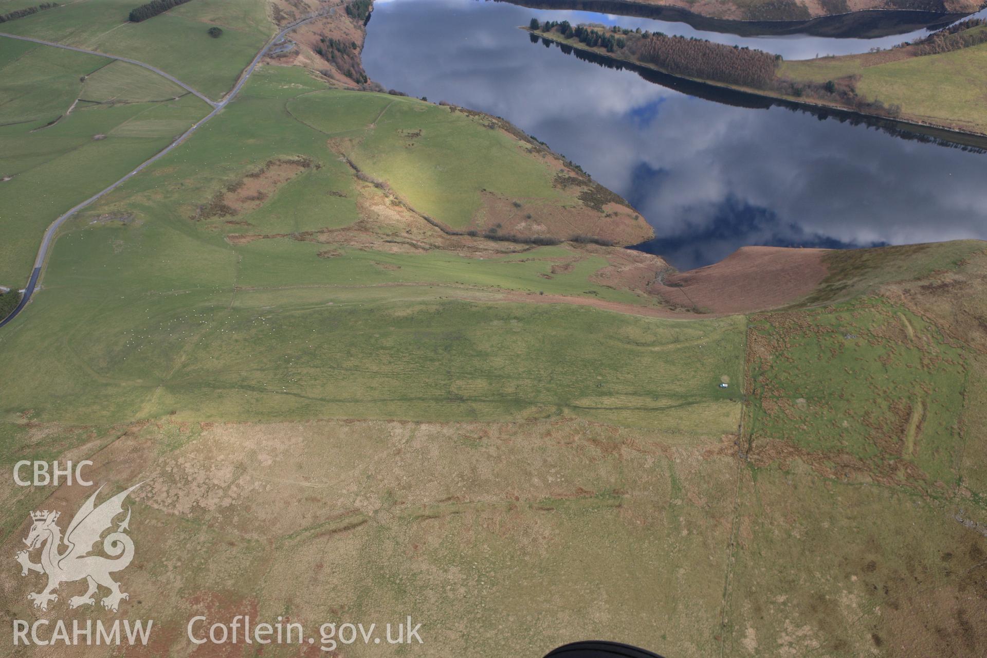 RCAHMW colour oblique photograph of Dinas Camp, Trefeglwys. Taken by Toby Driver on 22/03/2011.