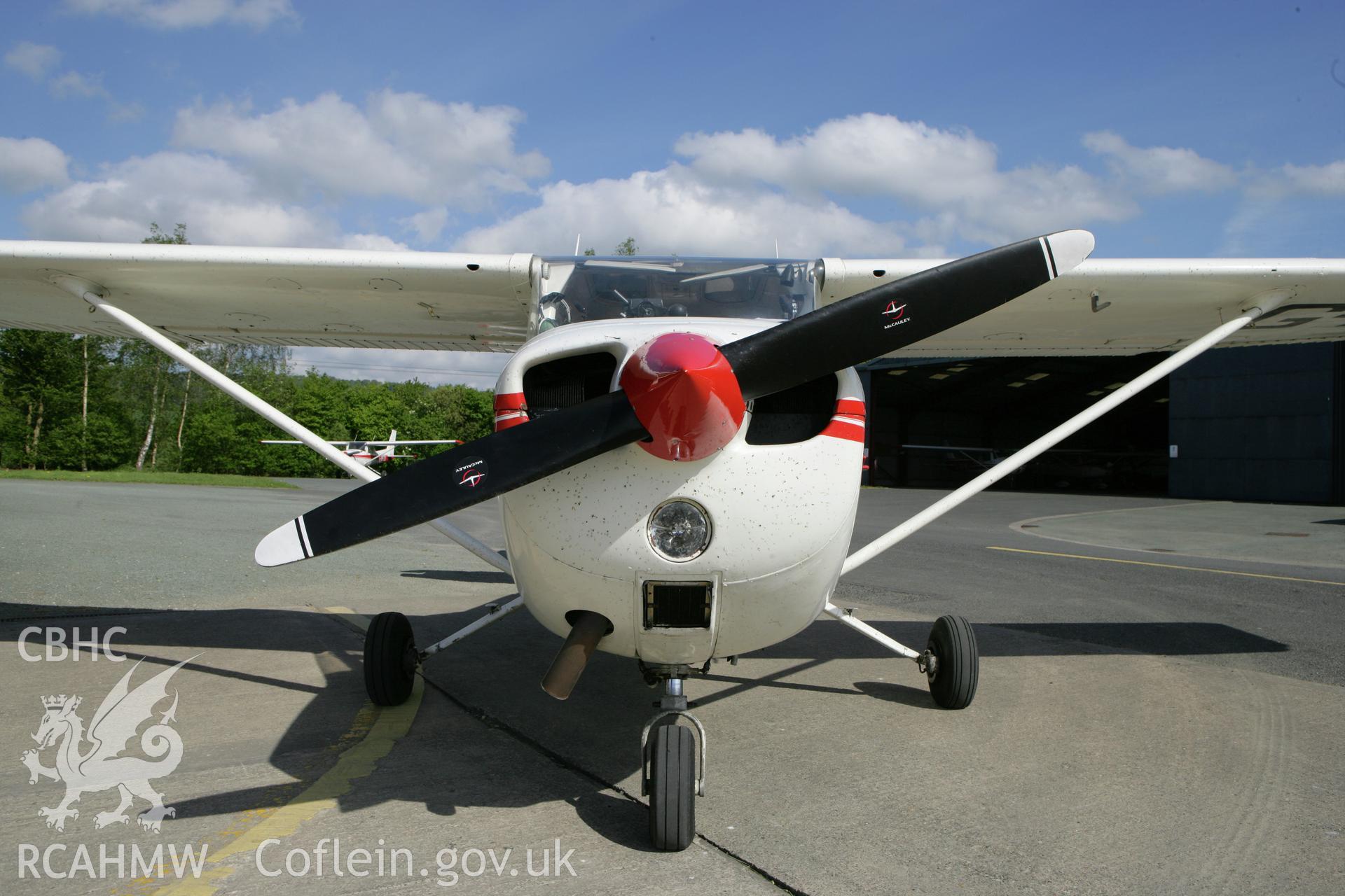 RCAHMW colour oblique photograph of Cessna at Montgomeryshire Mid Wales Airport. Taken by Toby Driver on 03/05/2011.