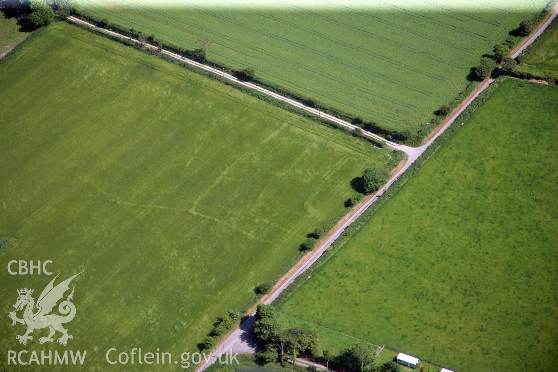RCAHMW colour oblique photograph of Ffynnon enclosure. Taken by Toby Driver and Oliver Davies on 28/06/2011.