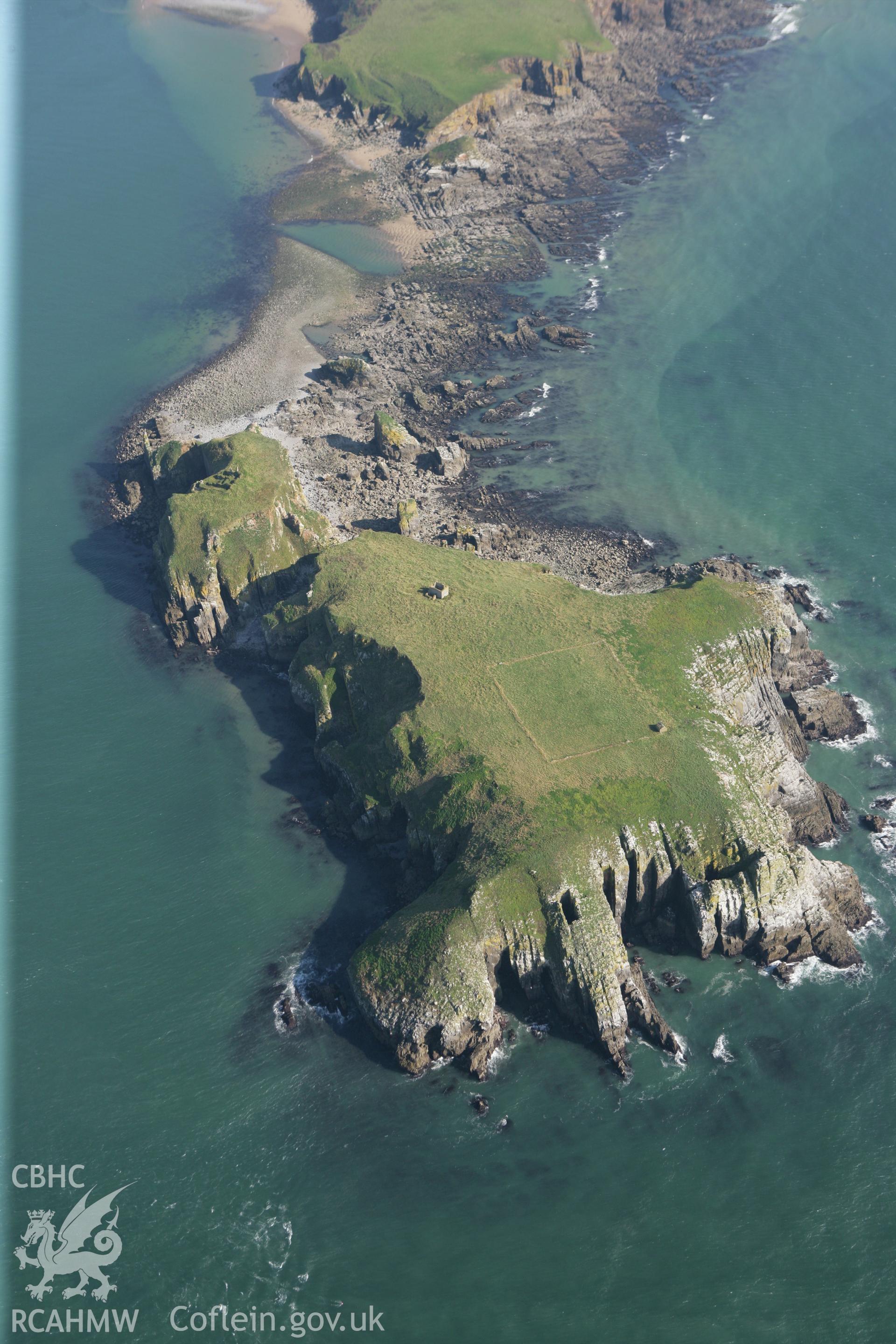 RCAHMW colour oblique photograph of monastic buildings and chapel ruins and Field Enclosure, St Margaret's Island. Taken by Toby Driver and Oliver Davies on 28/09/2011.