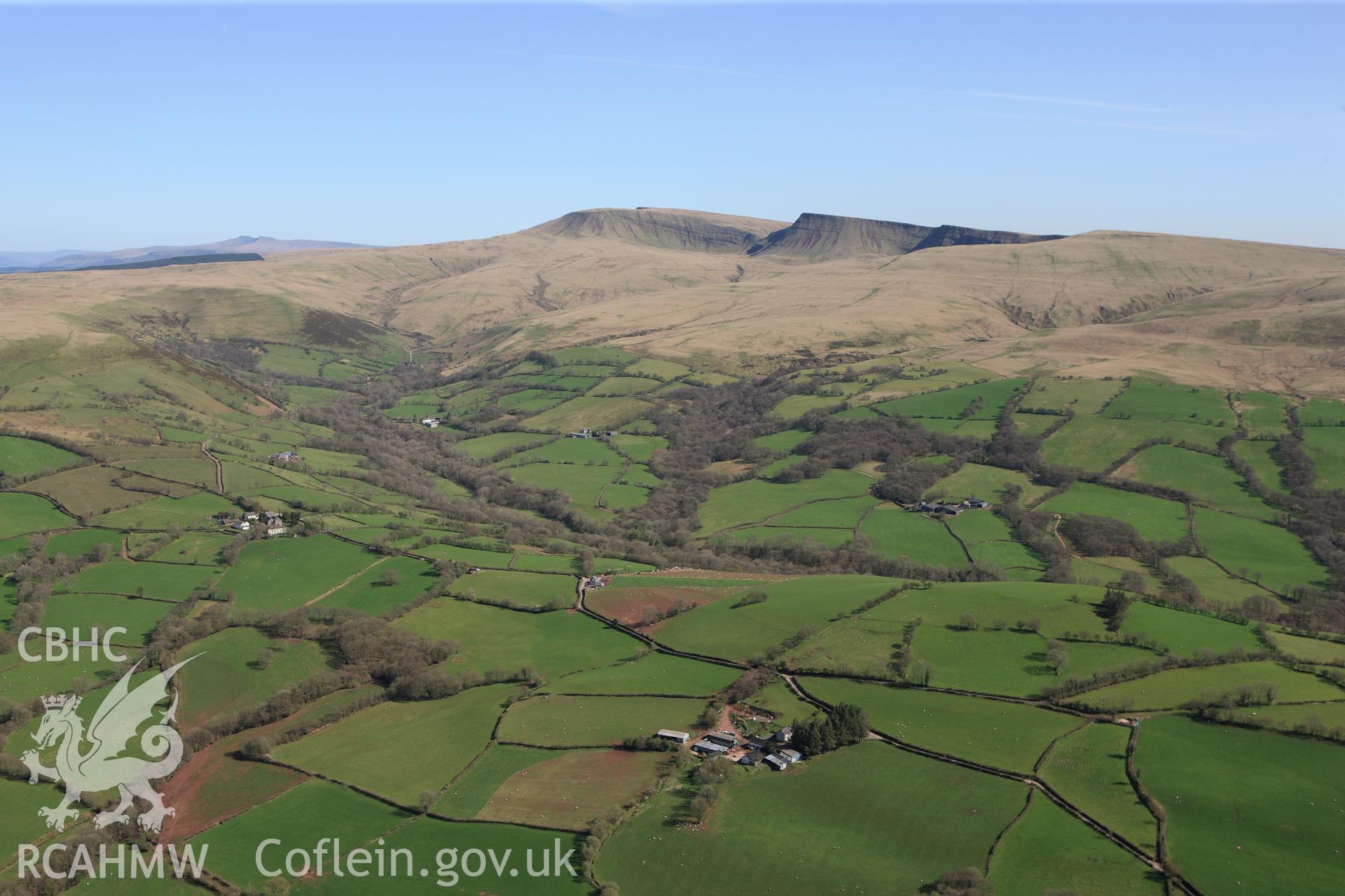 RCAHMW colour oblique photograph of View of Saints Simono and Jude's Church, Llanddeusant, looking south towards Black Mountains. Taken by Toby Driver on 08/04/2011.