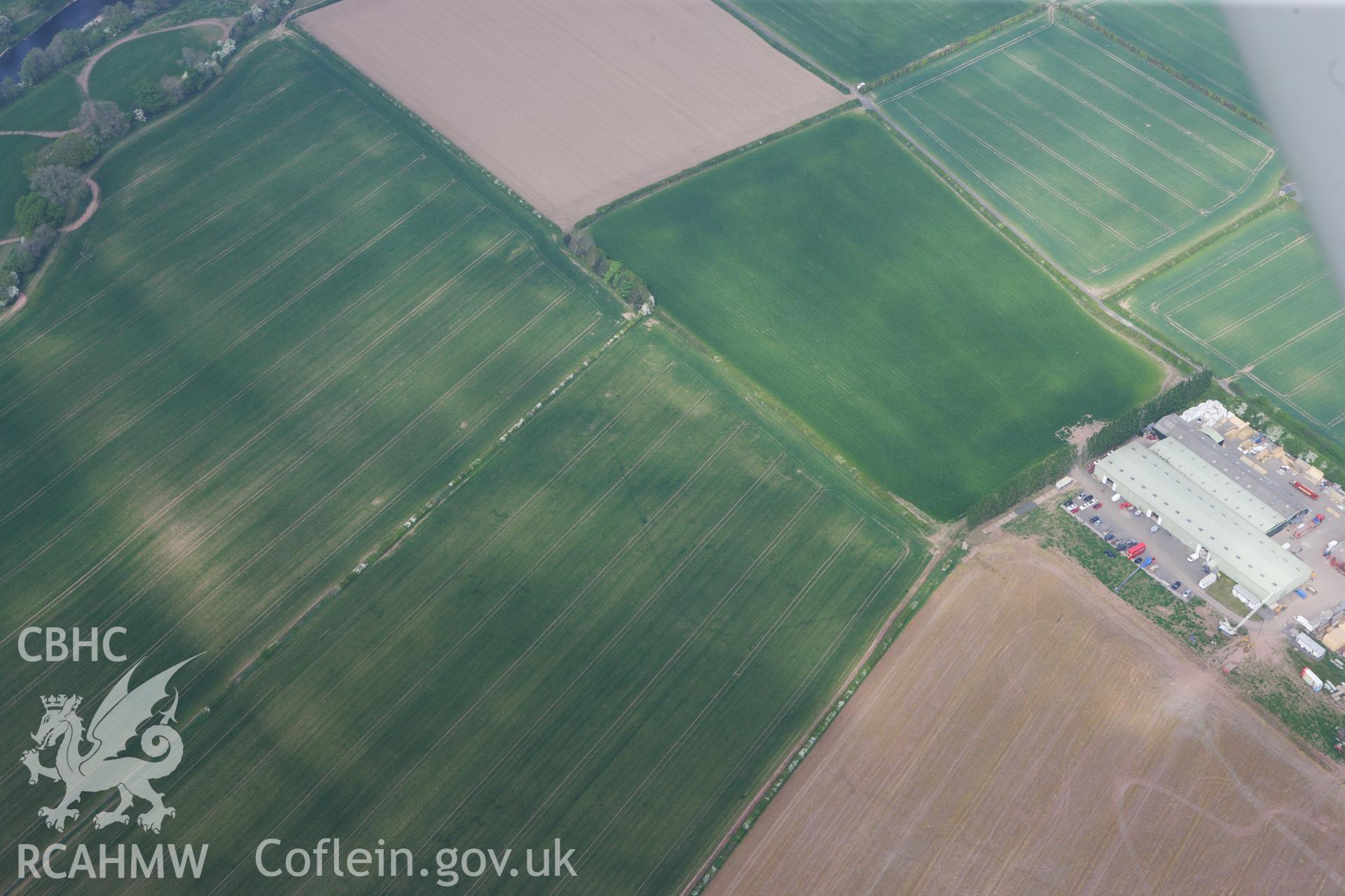 RCAHMW colour oblique photograph of Llancayo Farm Roman marching camp. Taken by Toby Driver on 26/04/2011.