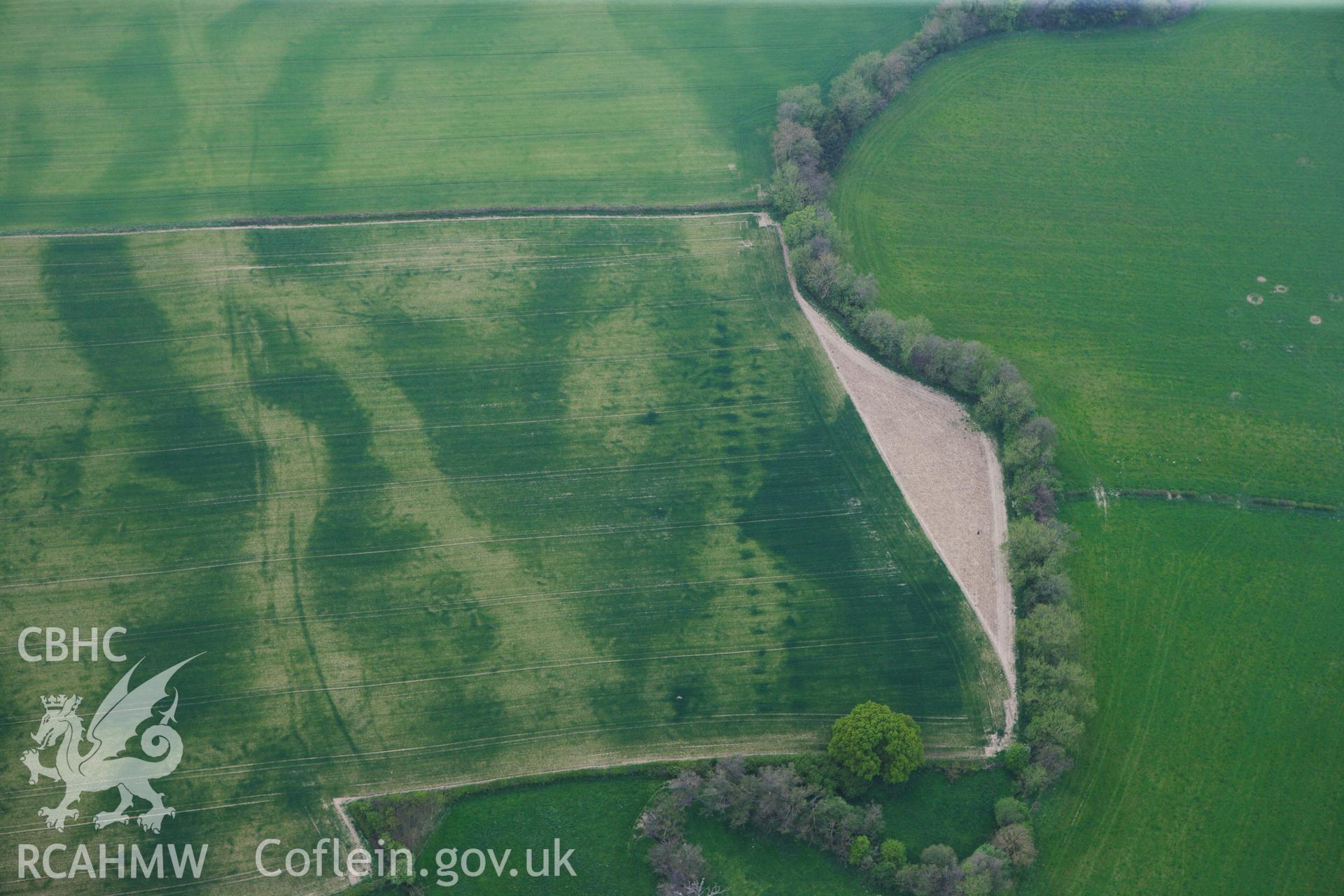 RCAHMW colour oblique photograph of Rossers Bridge, parallel pit alignment. Taken by Toby Driver on 26/04/2011.