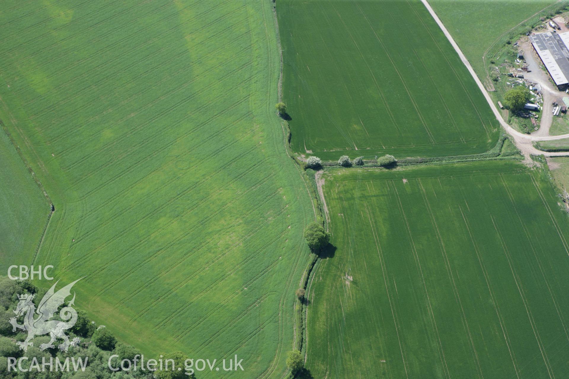 RCAHMW colour oblique photograph of Gerwyn-Fechan Round Barrow Cemetery. Taken by Toby Driver on 03/05/2011.