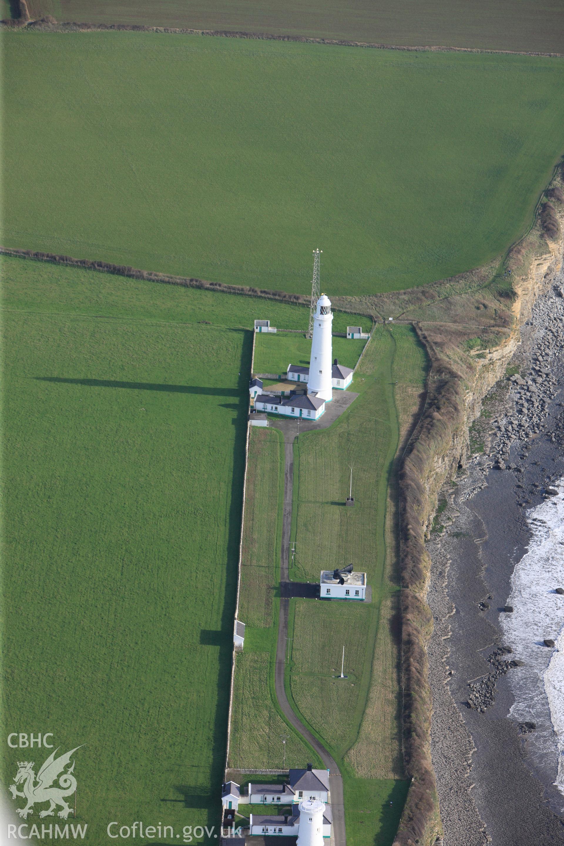 RCAHMW colour oblique photograph of East Tower, Nash Lighthouse, with Fog Horn Signal Building and West Tower. Taken by Toby Driver on 17/11/2011.