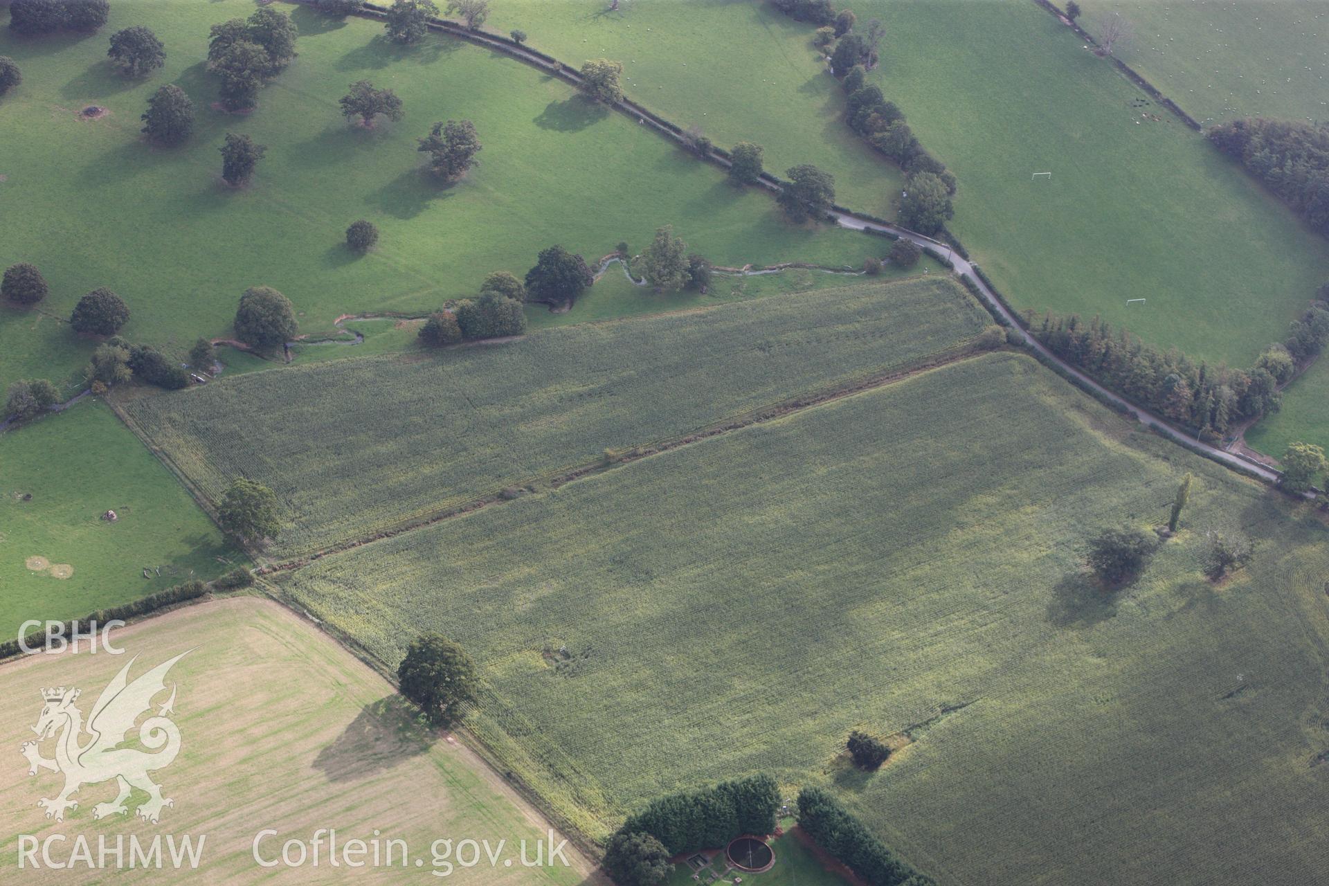 RCAHMW colour oblique photograph of Plas Newydd Romano-British Temple Cropwork; Plasnewydd Roman Temple. Taken by Toby Driver on 04/10/2011.