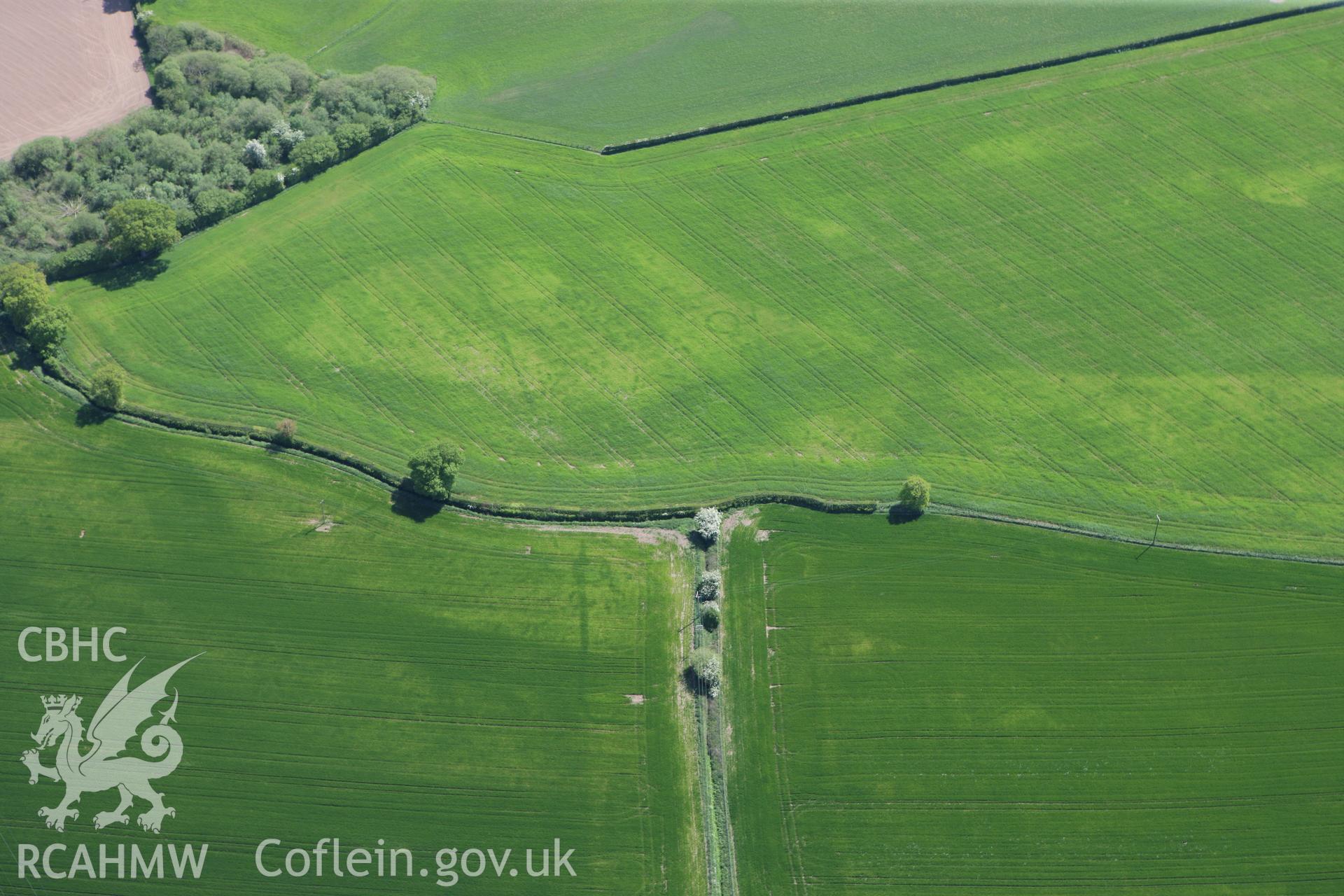 RCAHMW colour oblique photograph of Gerwyn-Fechan Round Barrow Cemetery. Taken by Toby Driver on 03/05/2011.