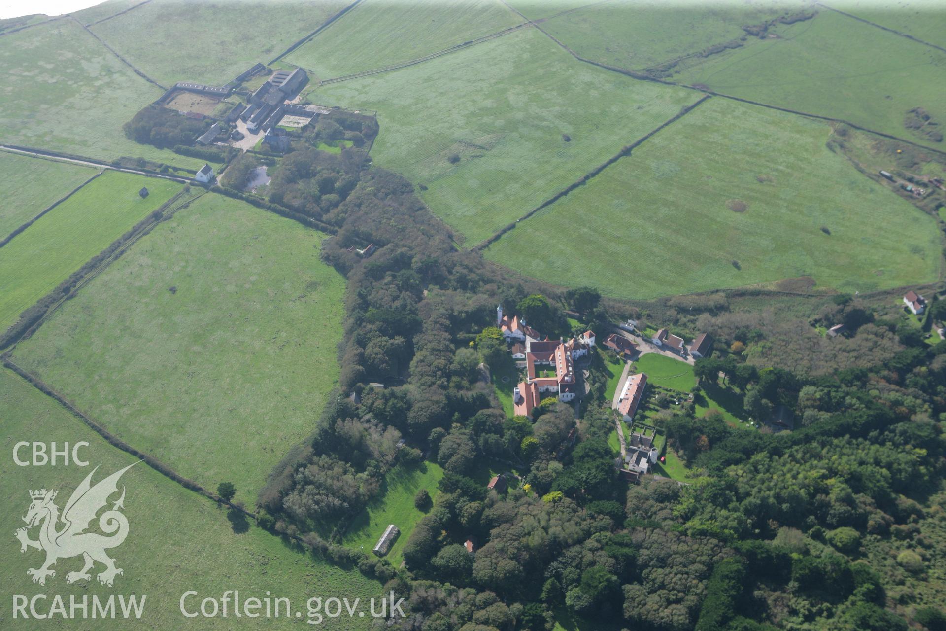 RCAHMW colour oblique photograph of Caldey Monastery, looking south towards Caldey Priory and garden. Taken by Toby Driver and Oliver Davies on 28/09/2011.