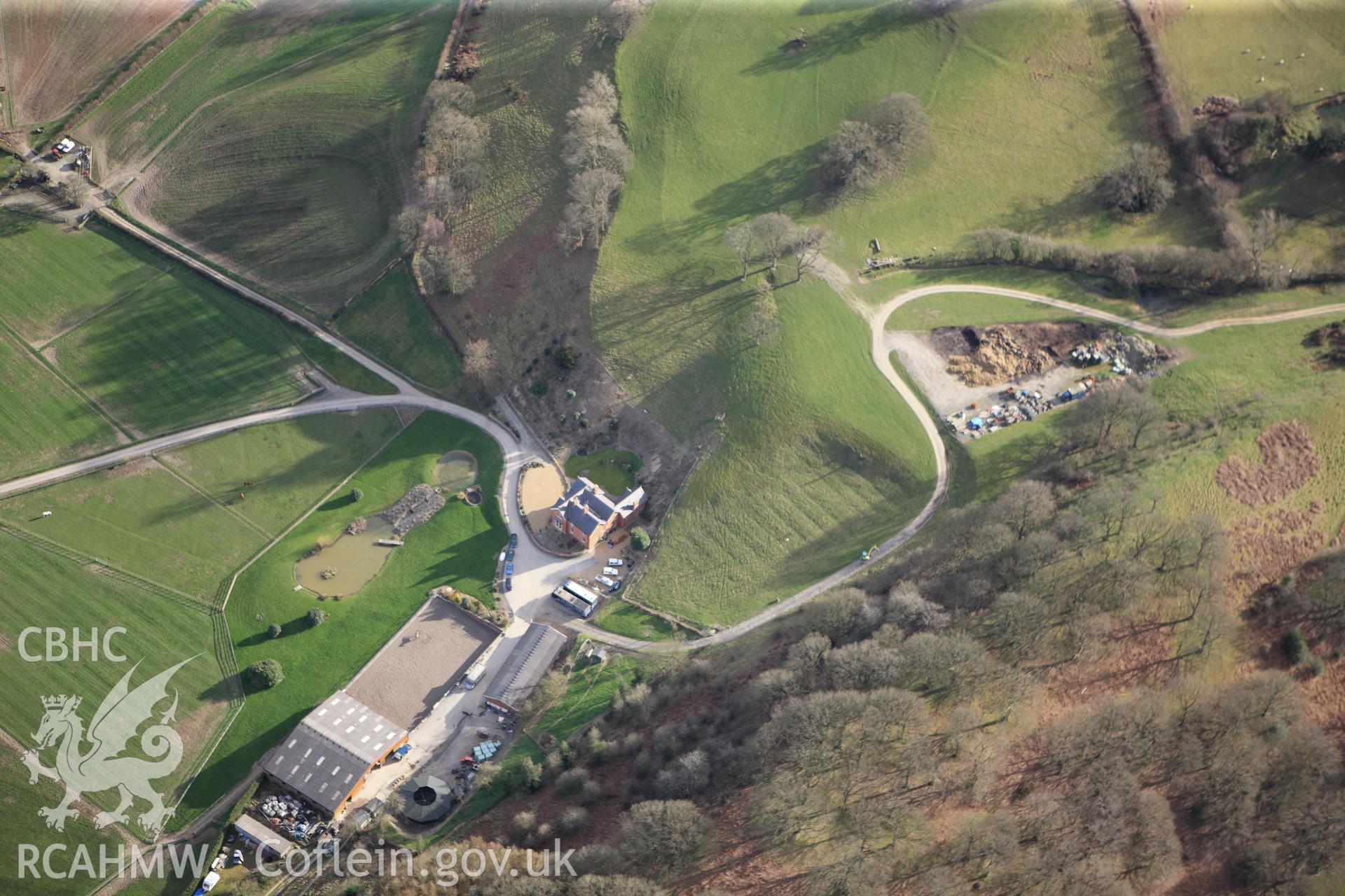 RCAHMW colour oblique photograph of Neuadd-Fraith, Aberbechan. Taken by Toby Driver on 22/03/2011.