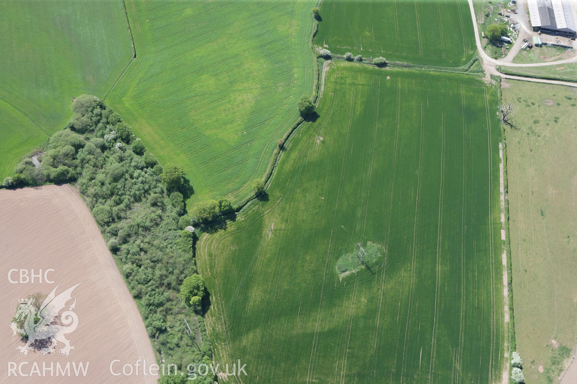 RCAHMW colour oblique photograph of Gerwyn-Fechan Round Barrow Cemetery. Taken by Toby Driver on 03/05/2011.