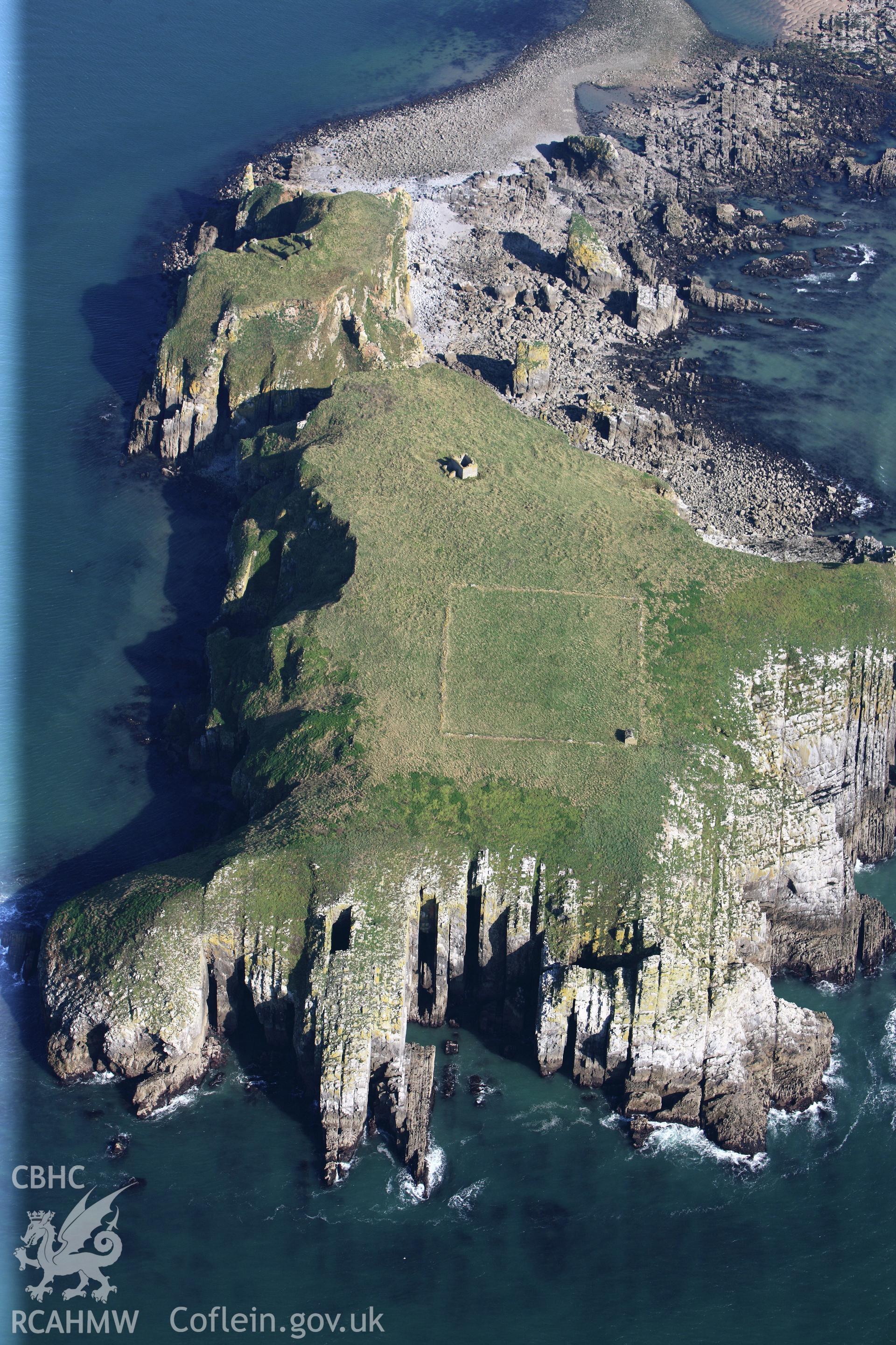 RCAHMW colour oblique photograph of chapel ruins and field enclosure, St Margaret's Island, viewed from the west. Taken by Toby Driver and Oliver Davies on 28/09/2011.