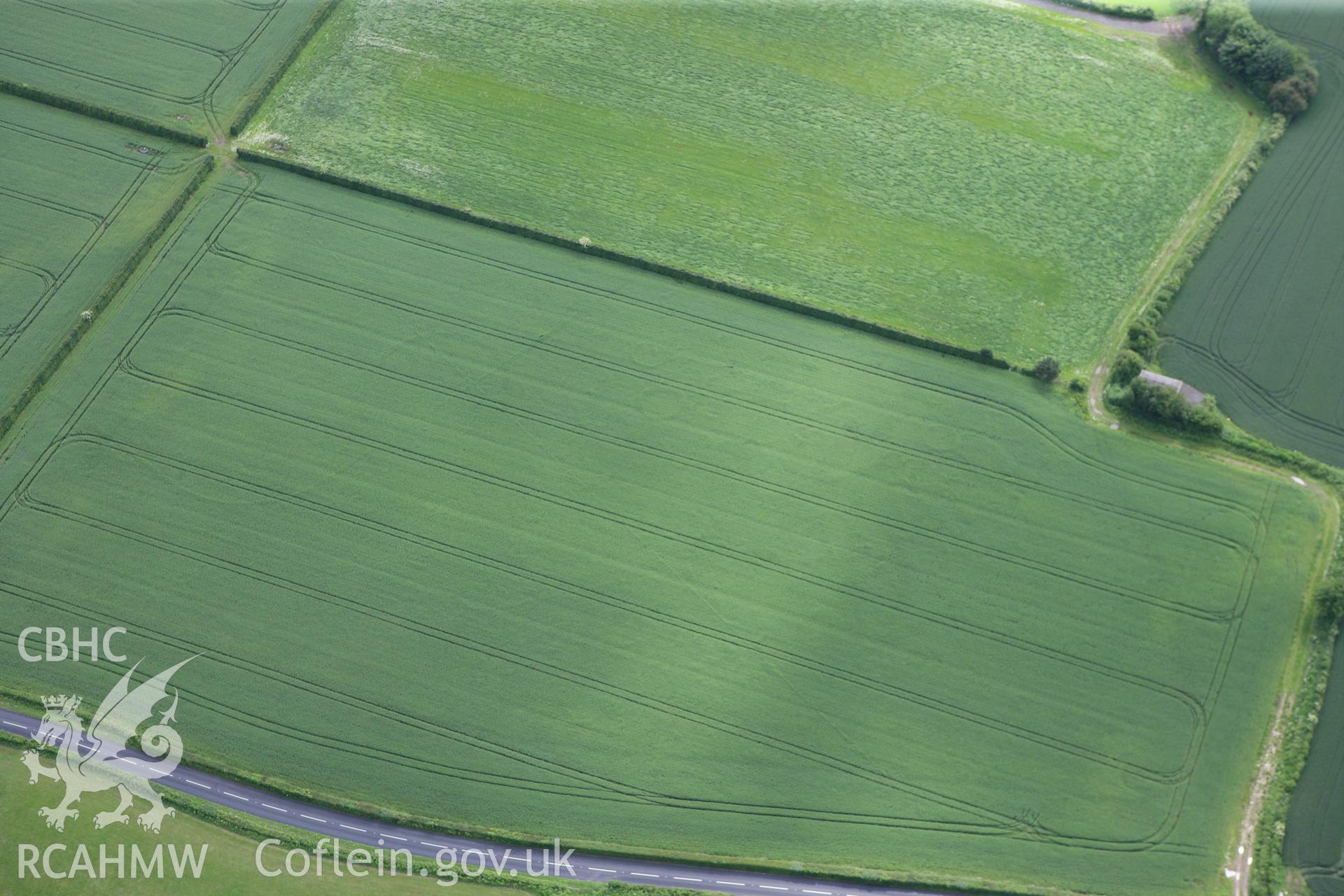 RCAHMW colour oblique photograph of Llancayo Farm barrow cemetery. Taken by Toby Driver on 13/06/2011.