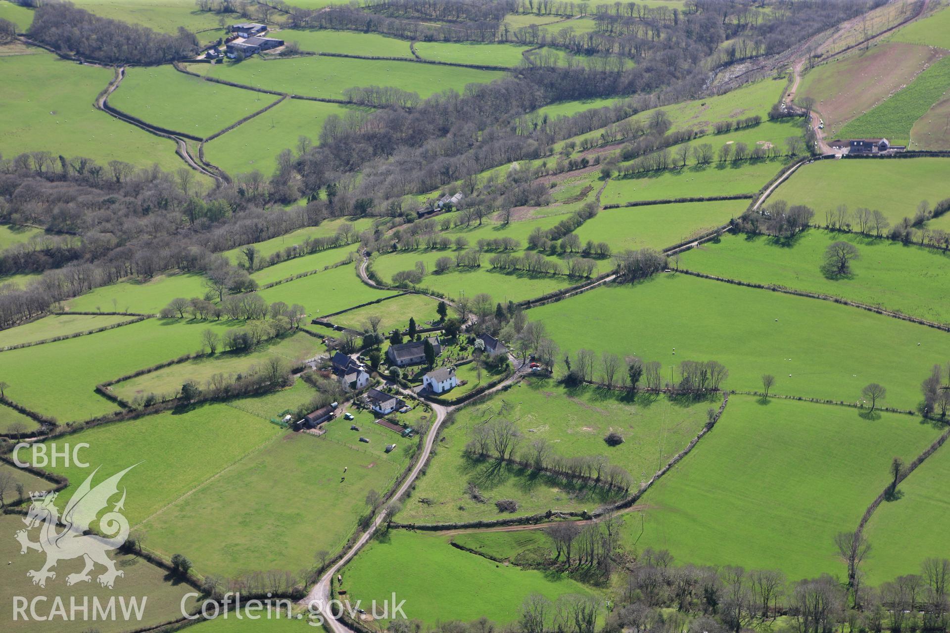 RCAHMW colour oblique photograph of Saints Simono and Jude's Church, Llanddeusant. Taken by Toby Driver on 08/04/2011.