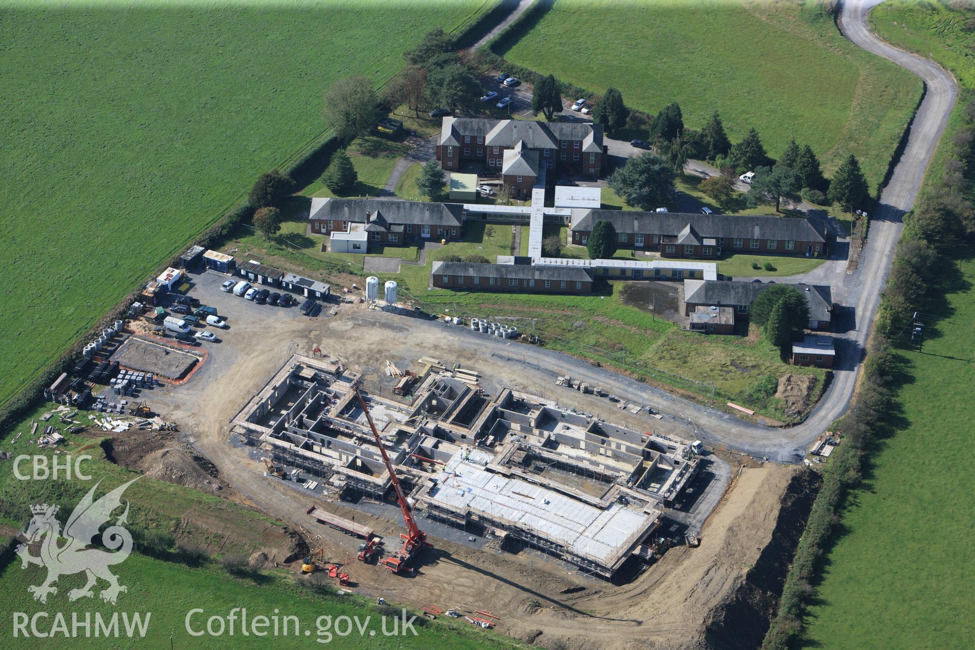 RCAHMW colour oblique photograph of Ysbyty Mynydd Mawr, with Gwalia Mynydd Mawr under construction, Llannon. Taken by Toby Driver and Oliver Davies on 28/09/2011.