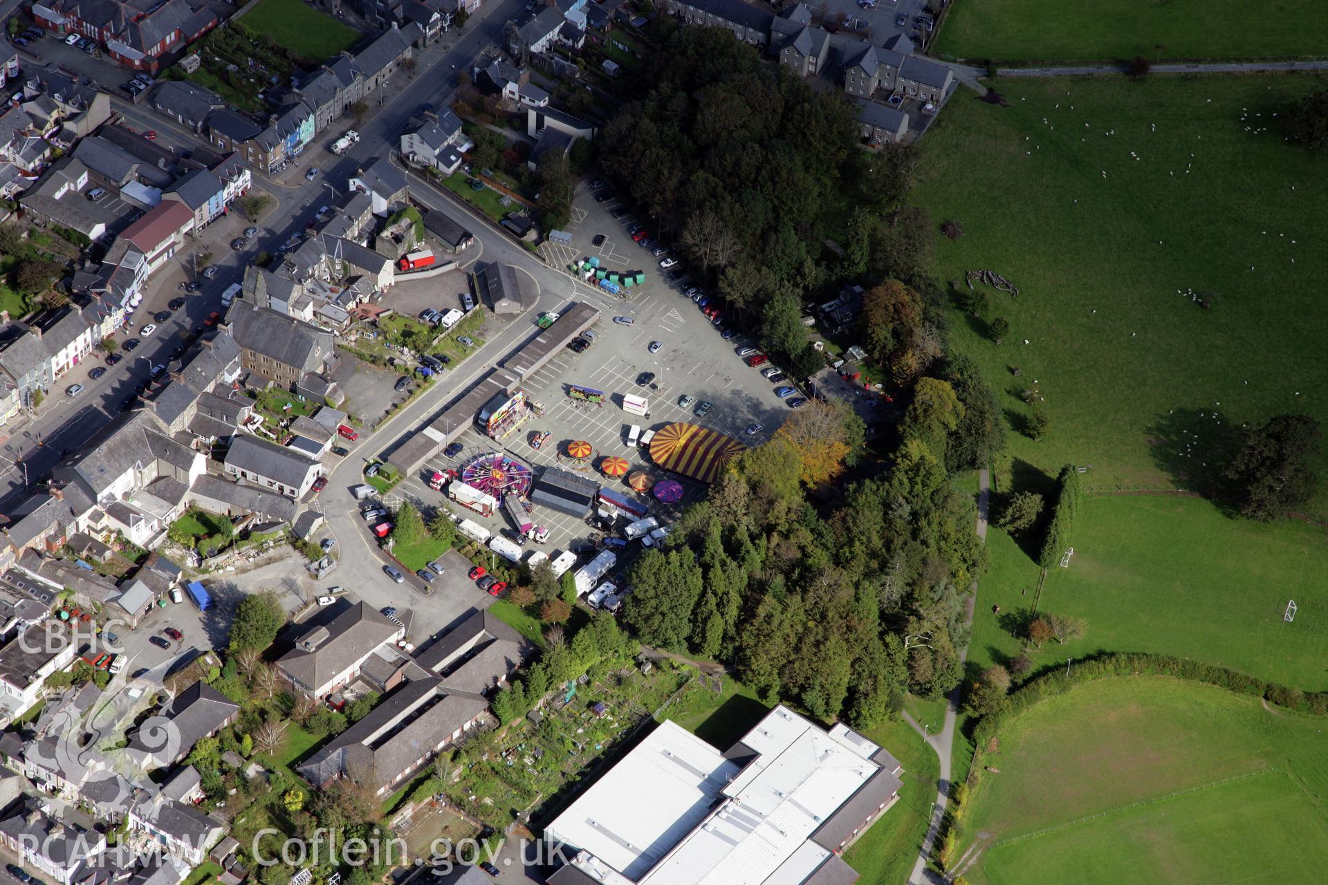 RCAHMW colour oblique photograph of View of Machynlleth, car park centre, Maengwyn Street top left corner of photo. Taken by Oliver Davies on 29/09/2011.